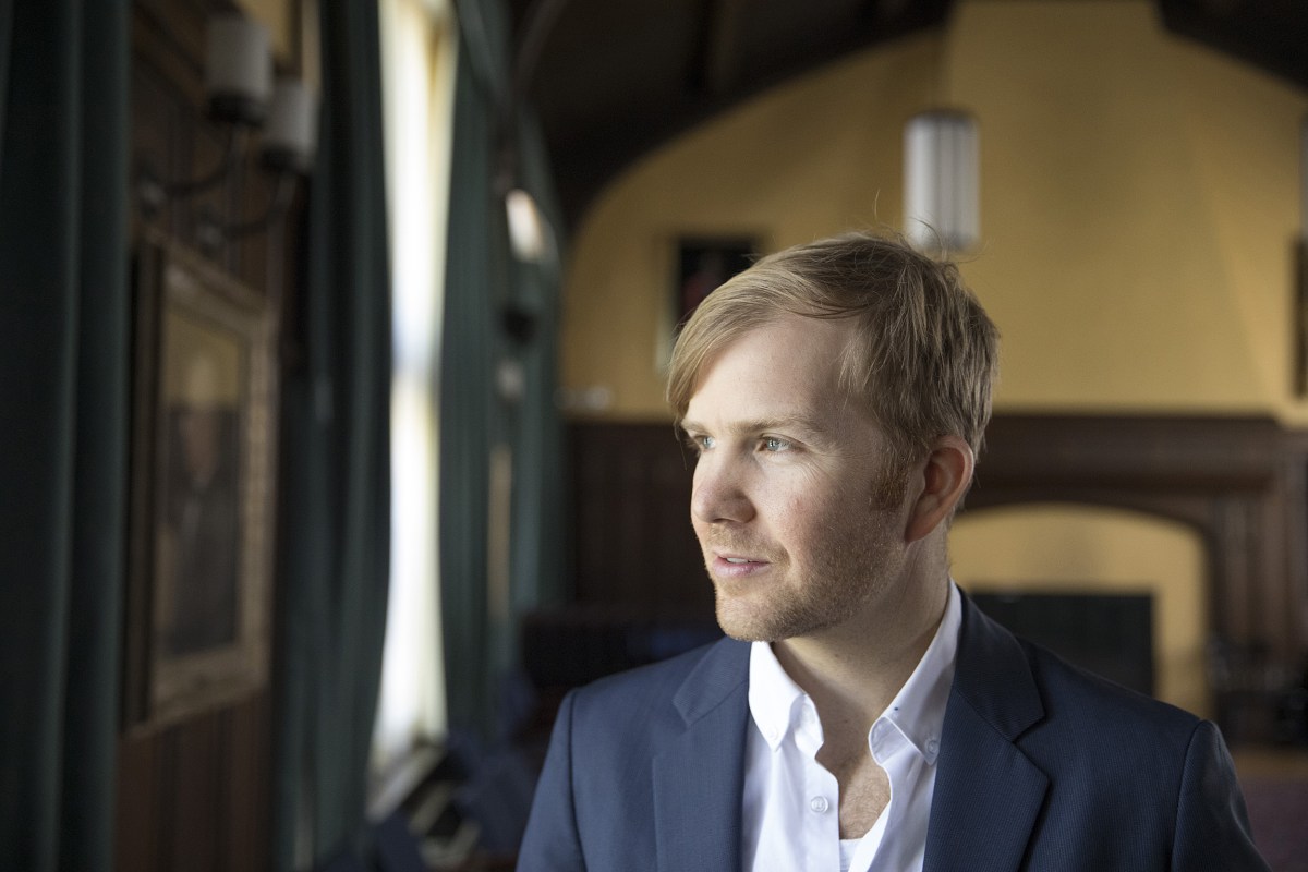Zachary Davis is the host of the podcast "Ministry of Ideas." Photo by Kris Snibbe/HarvardUniversity
