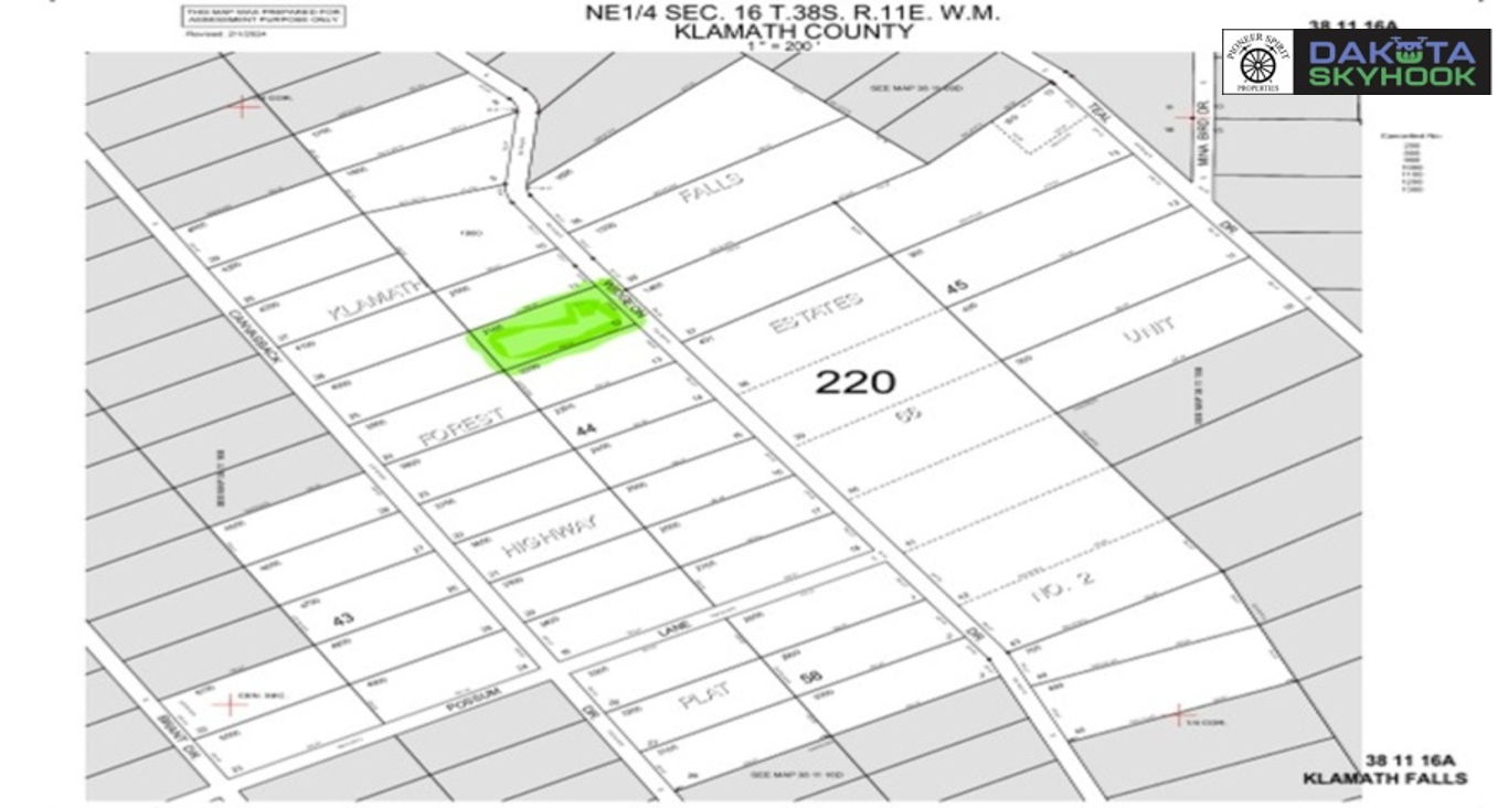 Survey map of Klamath County showing a highlighted green plot of land at the intersection of East Falls and Yuma, with surrounding plots and street names, including Highview, Forest, and Hurst.
