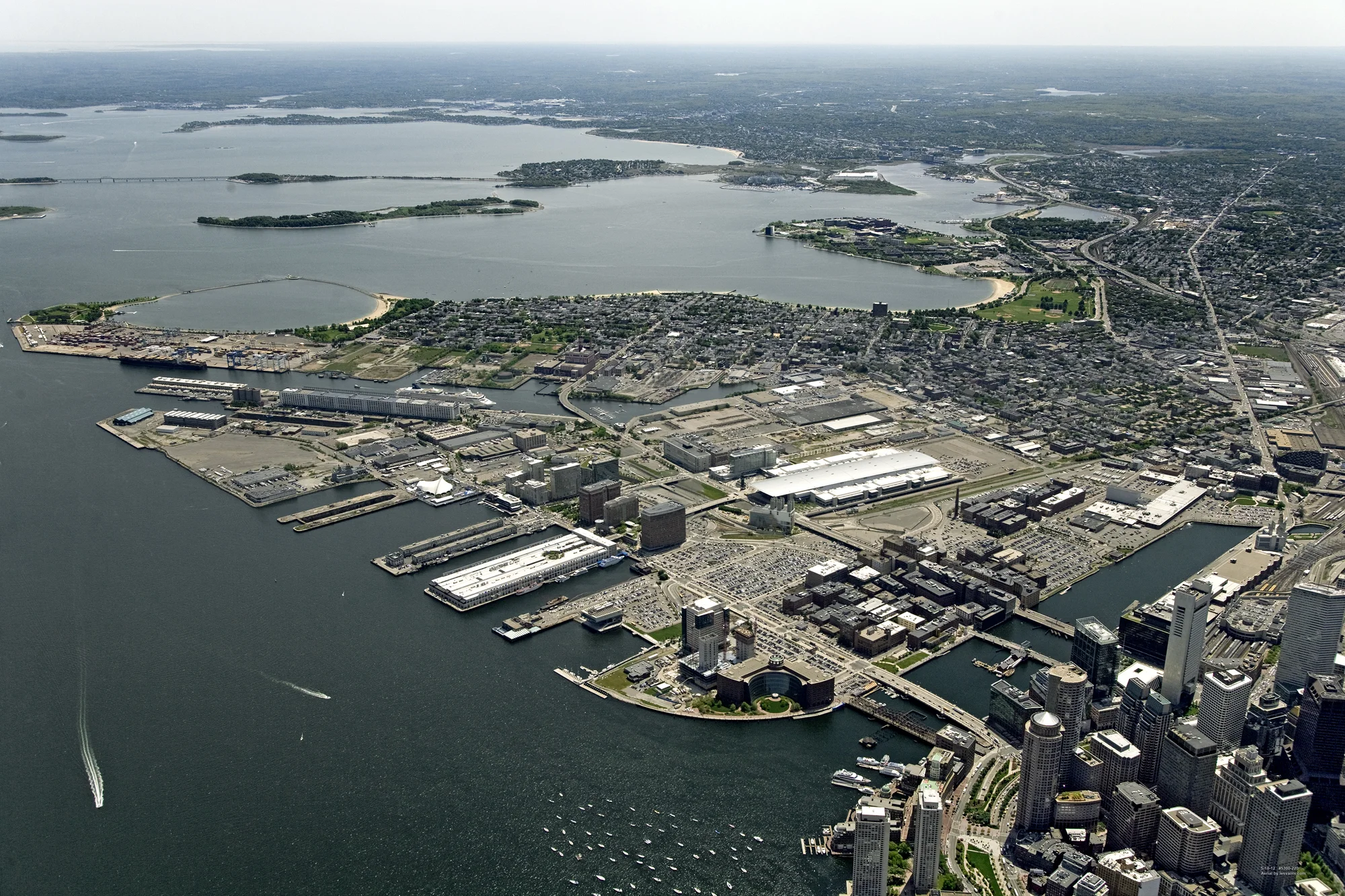 The Seaport before the Innovation District initiative began. It’s easy to identify the former railyard areas in this post-industrial neighborhood, because they were paved over into acres and acres of parking lots.