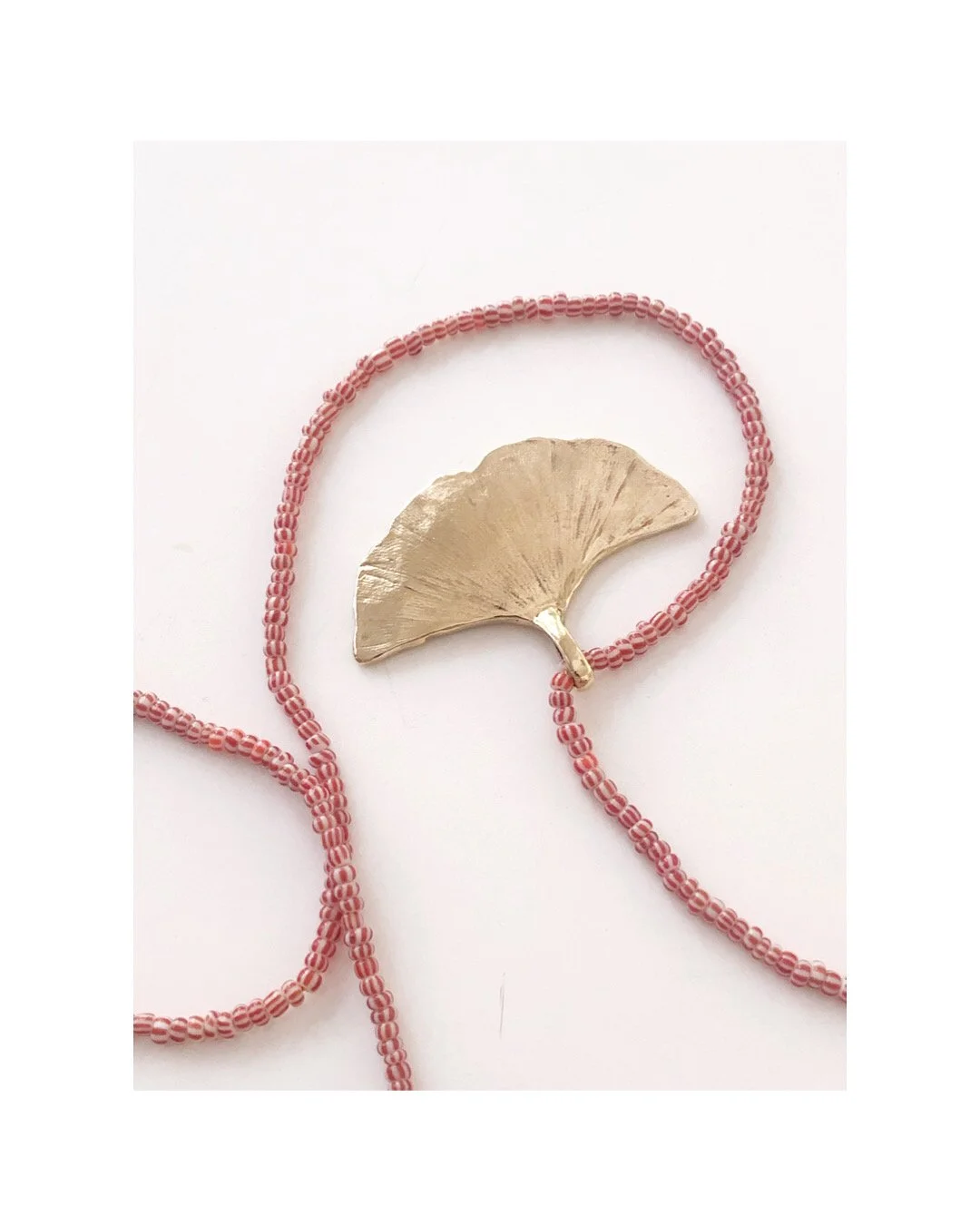 GINKGO Pendant with tiny vintage Venetian red and white beads