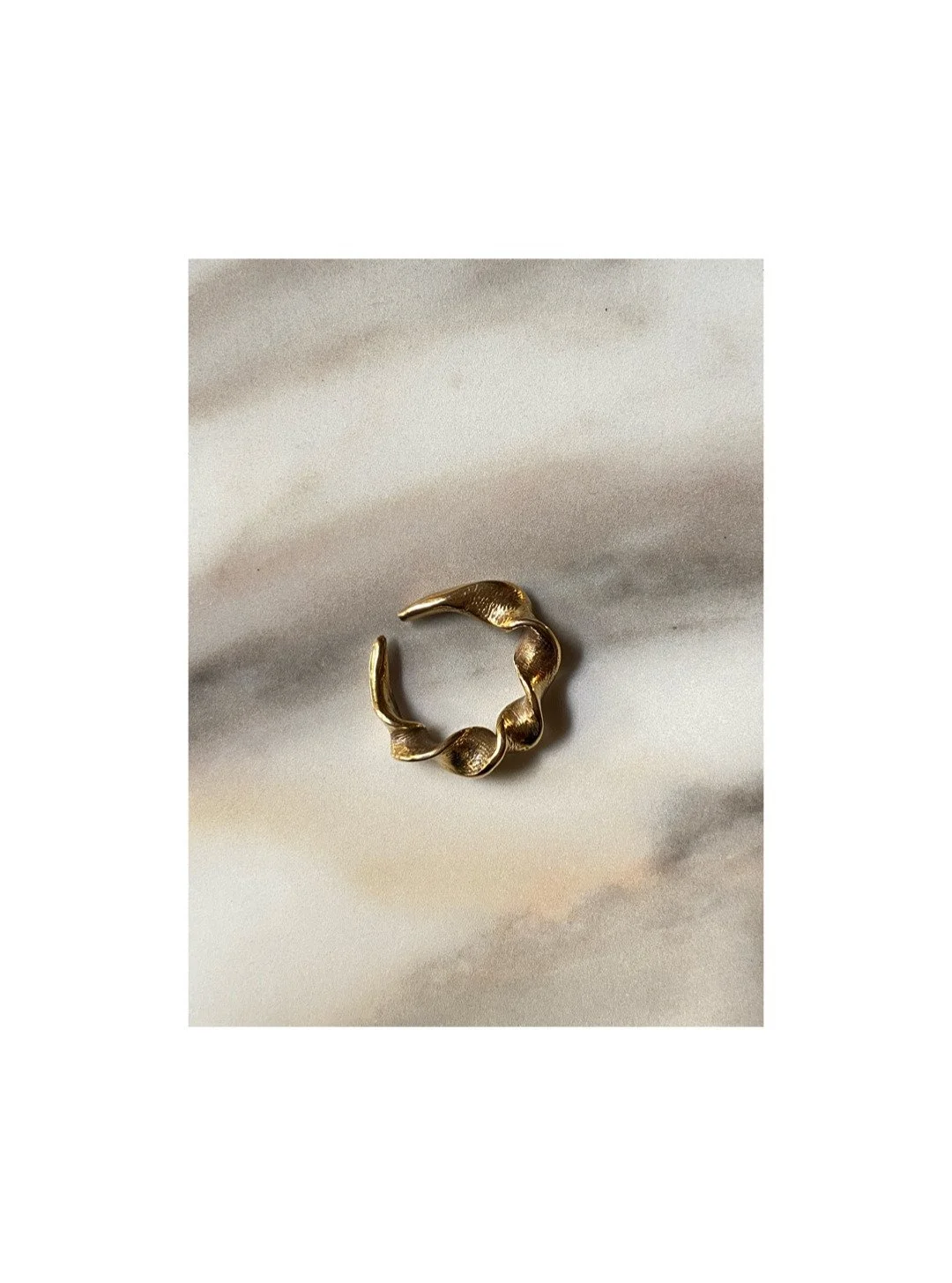 Big. Twisting. Unapologetically sculptural. #AglaiaJewelry
.
.
.
.
.
#artInAdornment #GiroRing #ring #holidaygifts #giftforher #sustainableluxury #ethicaljewelrygifts #brass #powerofbeauty #sculpturaljewelry #brasscooljewelry #italiandesign #madeinth
