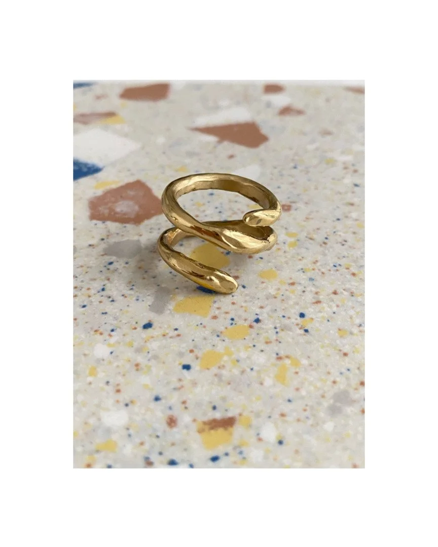 A sculptural spiral in constant motion.
Not ornamental &mdash; architectural.

The Vertigo Ring curves around the finger like a suspended gesture, echoing movement, tension, and release. It doesn&rsquo;t decorate the hand. It changes its posture.

Fo
