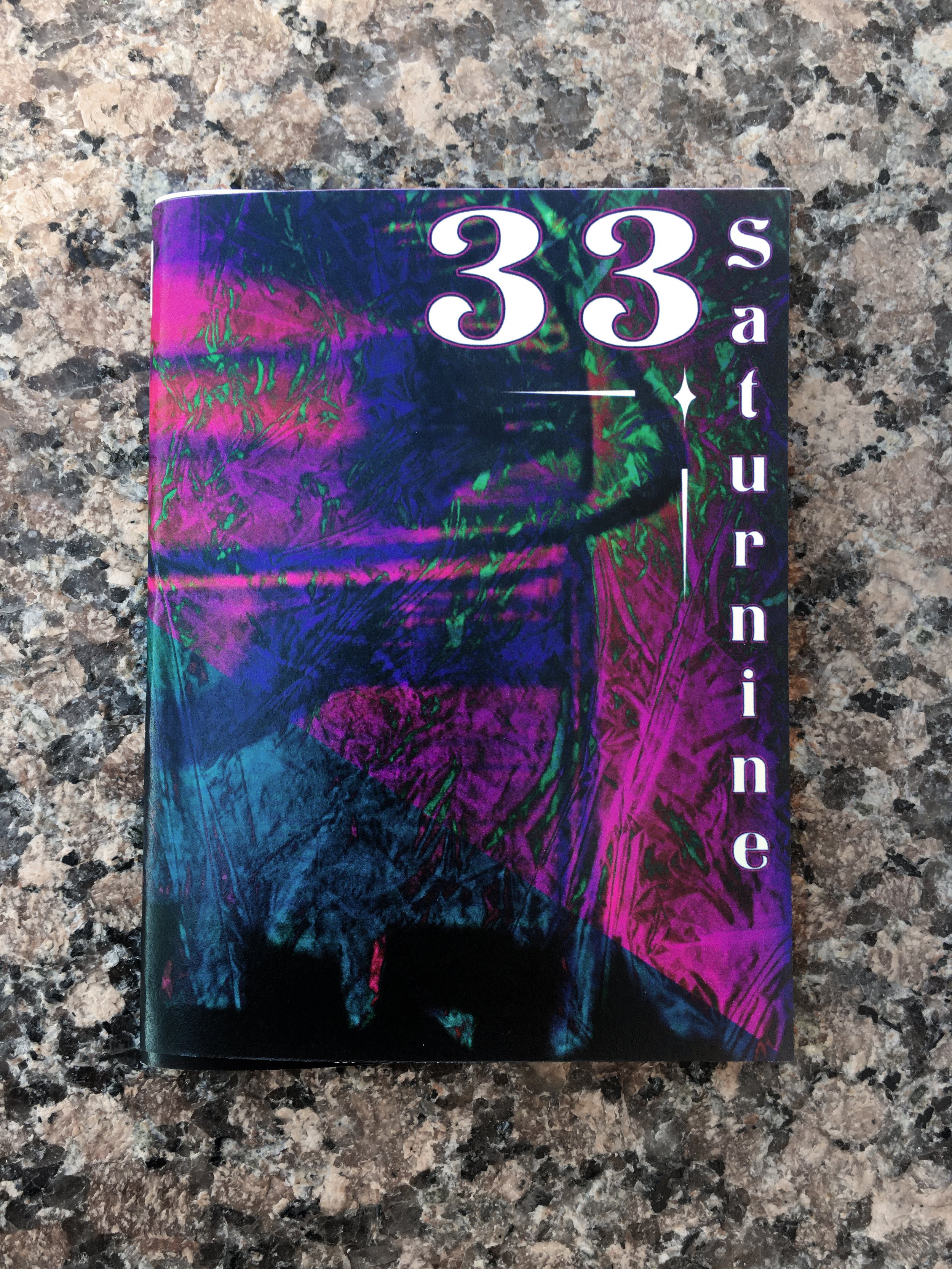 33 Saturnine (cover)
