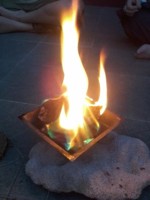 Burning Agnihotra Fire in sacred copper pyramid vessel