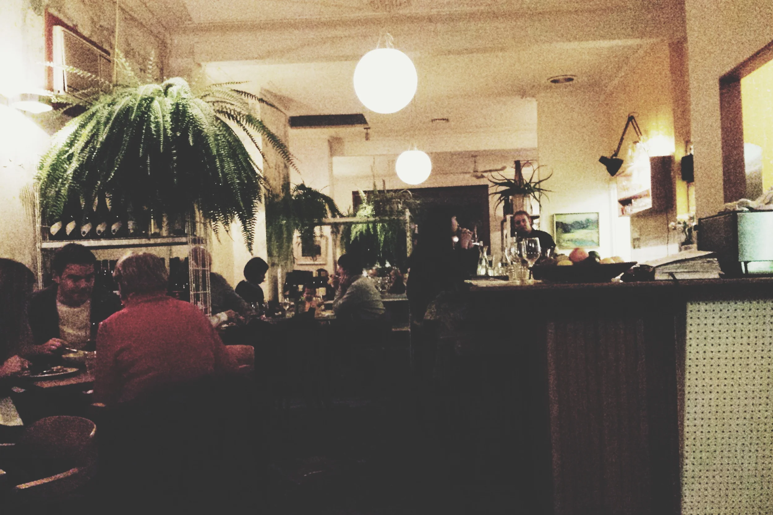 Cosy and modern. With quaint and homely touches throughout. Lots of private yet inclusive spaces to eat and drink.