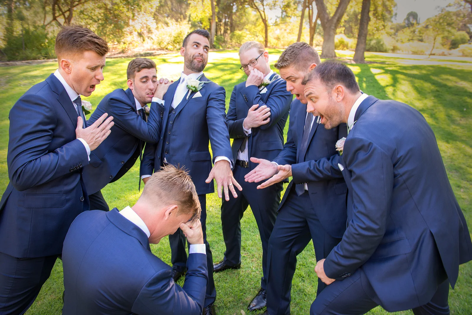 Groom shows of ring while Groomsmen gasp in awe! Kings Park