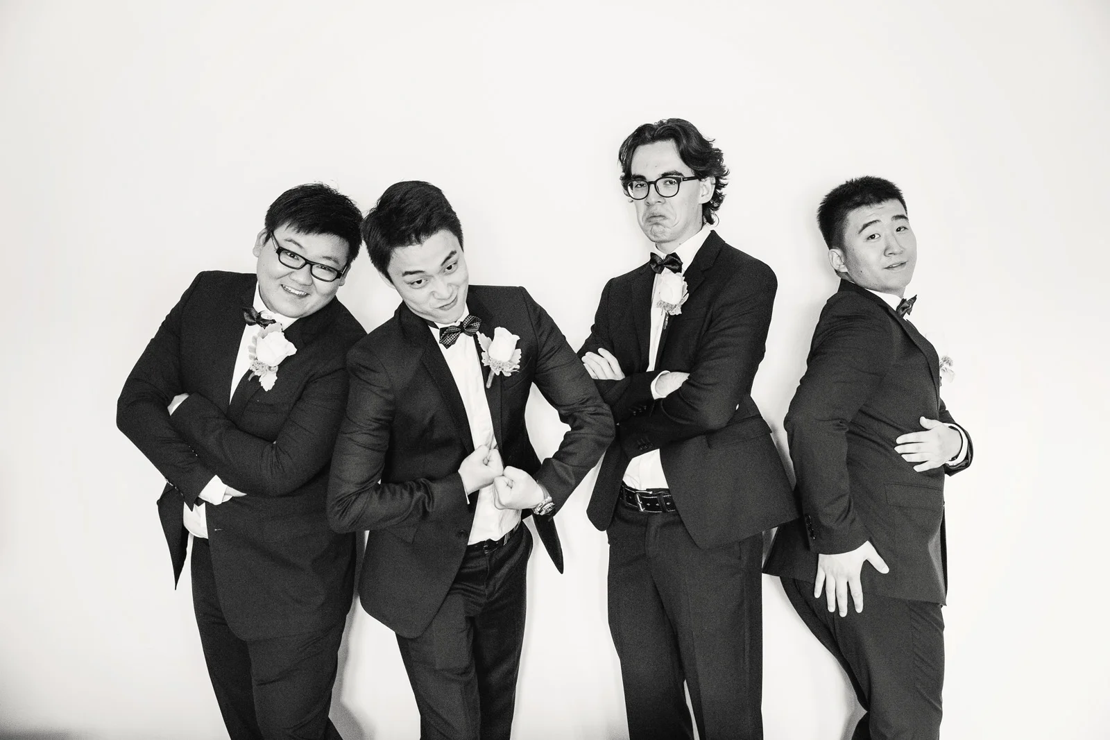 Groom with his Groomsmen having fun and goofing about