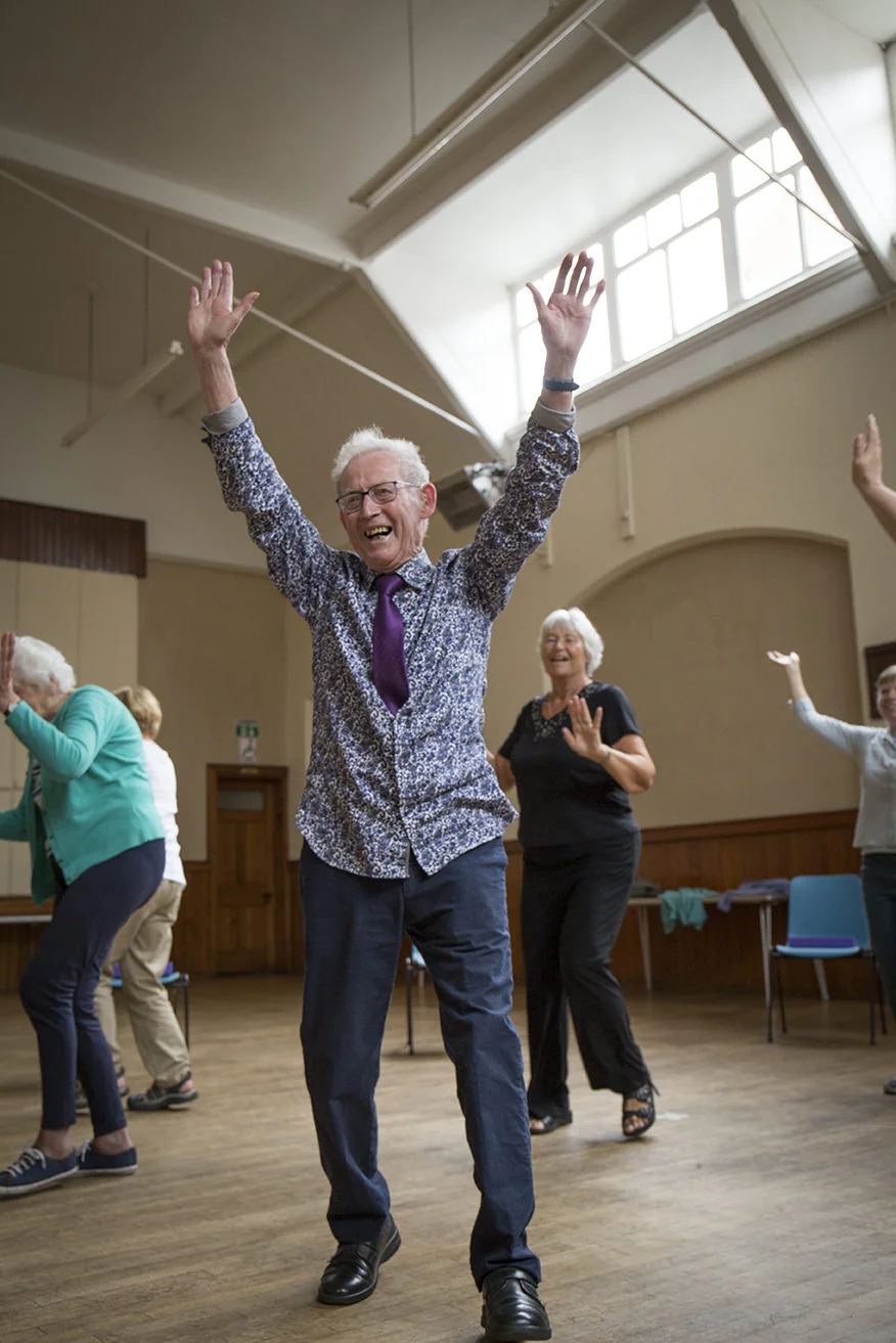 A dancing continuity announcer