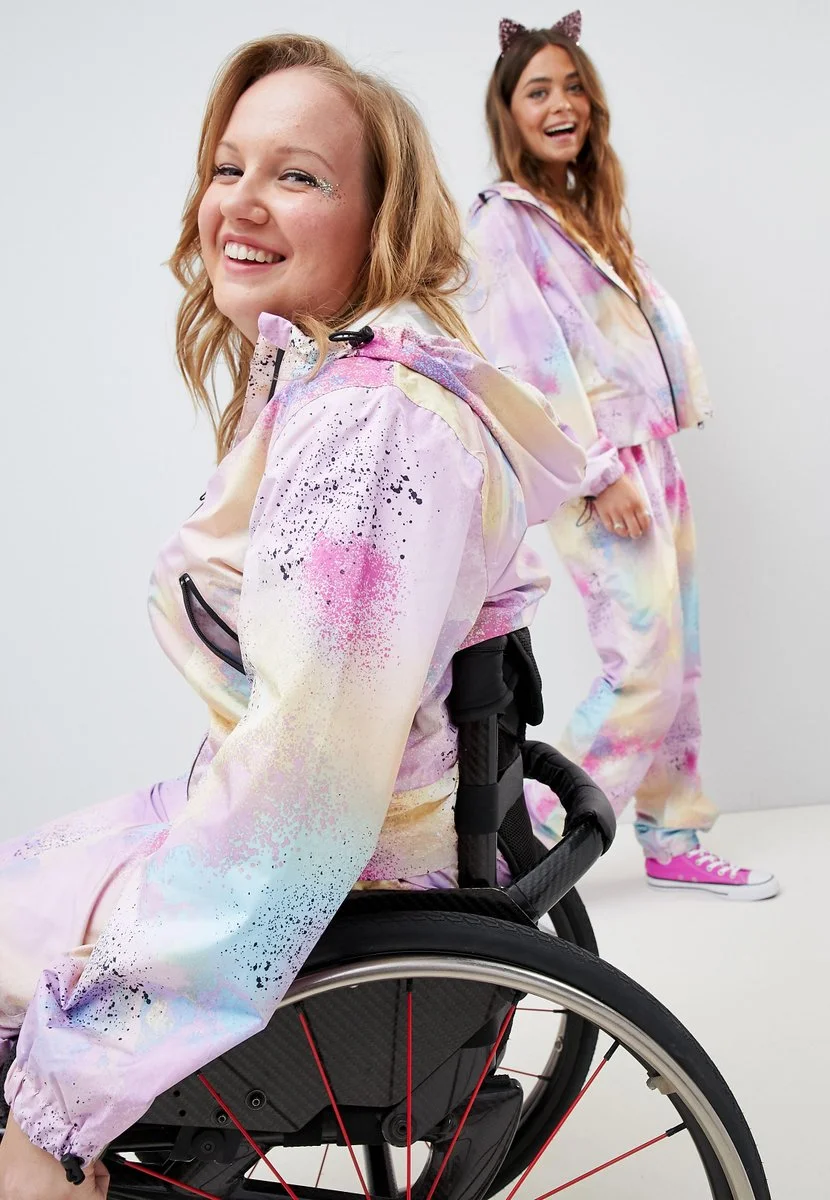 Pictured: Chloe and her friend smile into the camera as they model their jumpsuits.