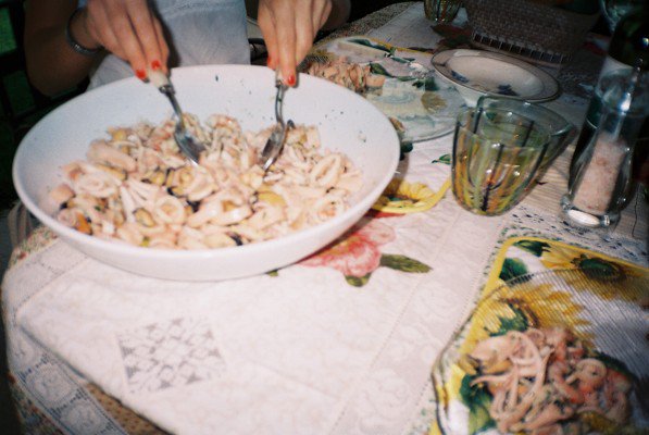 Then we eat the octopus - boiled in water, dressed with olive oil, lemon juice and a nit of finely chopped parsley. Buon Appetito. 