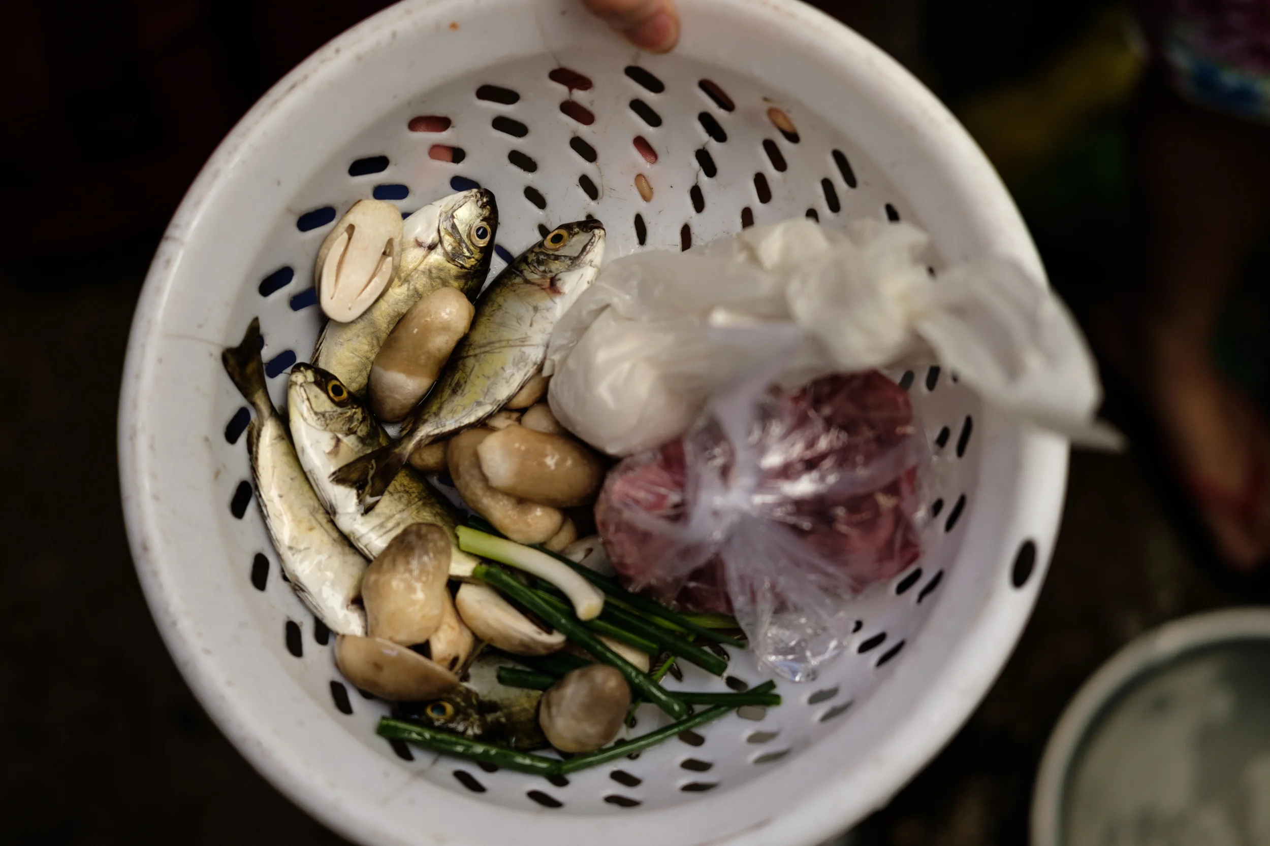 Breakfast ingredients, you can buy the ingredients you want in the market and have someone there prepare you a meal from them while you wait.