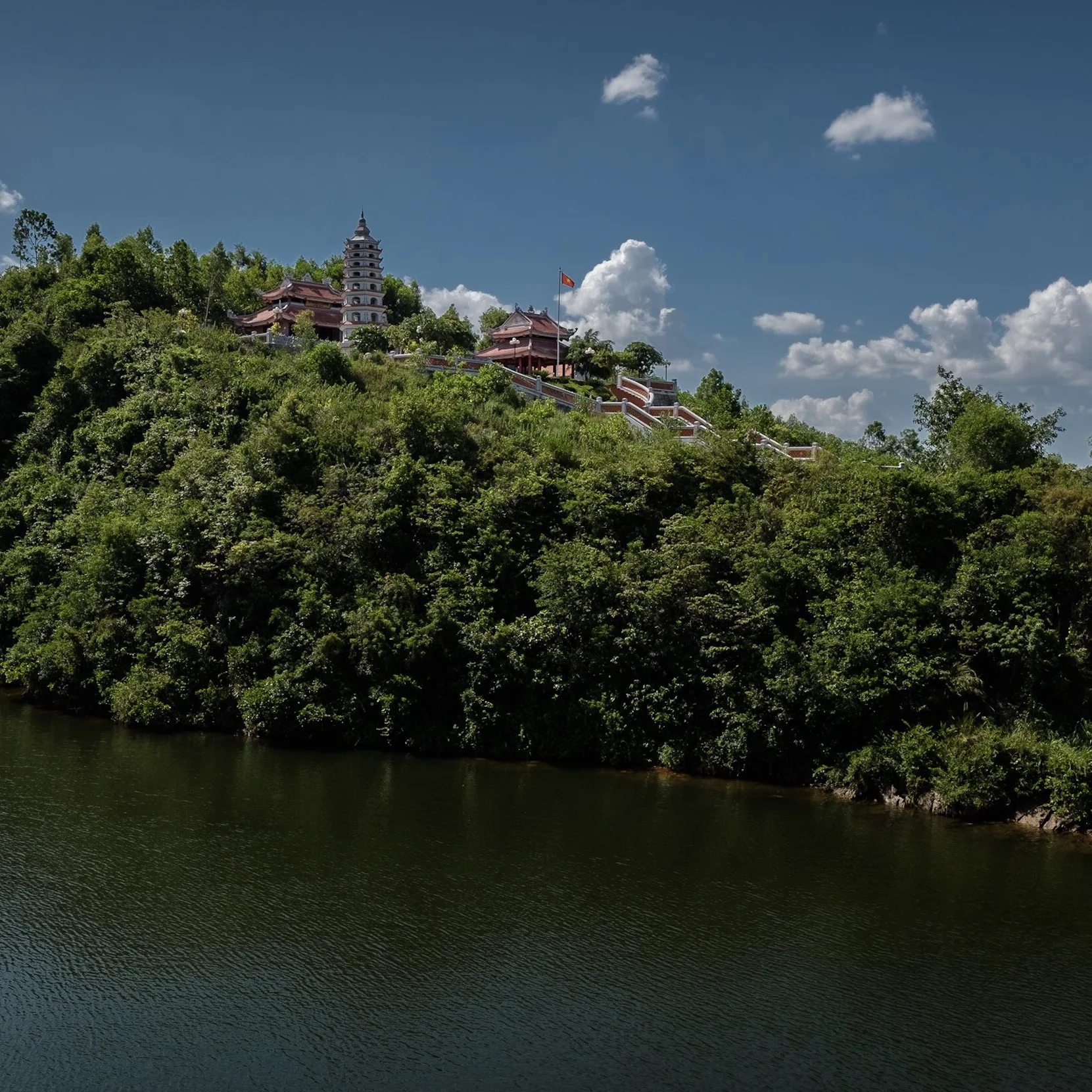 E: The memorial temple for the heroic martyrs of the Long Dai ferry-boats. Two teams of fifteen voluntary youths died here when they were bombed while doing their tasks, on two separate occasions. The temple serves as a memorial. 