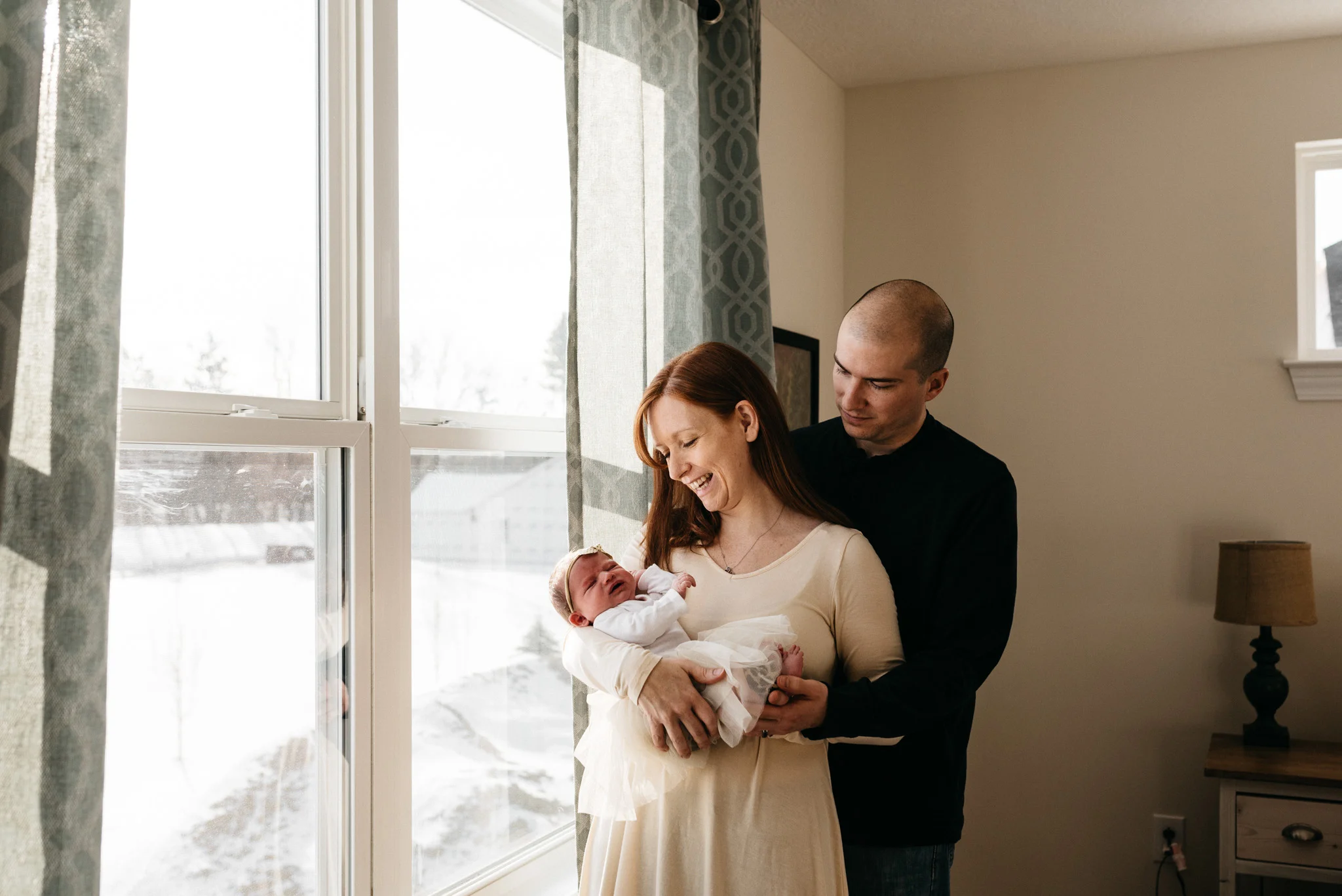 Parents-holding-newborn-daughter-Columbus-Ohio-Photographer-Erika-Venci-Photography