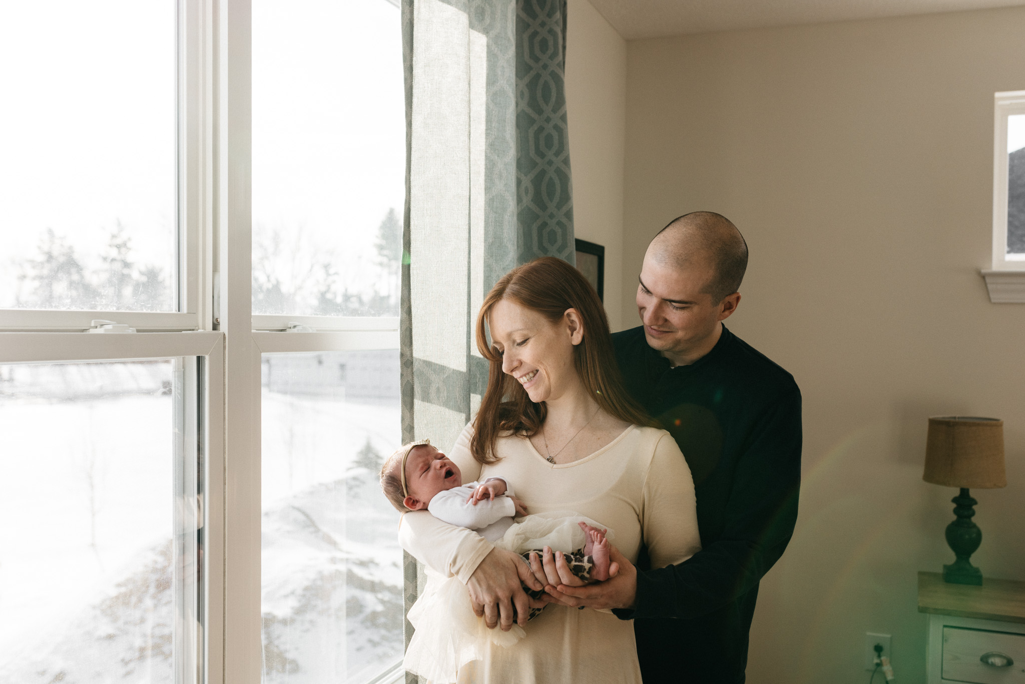 Parents-holding-newborn-daughter-Columbus-Ohio-Photographer-Erika-Venci-Photography