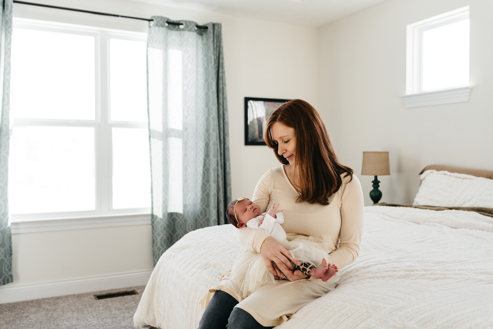 Mother-holding-newborn-daughter-Columbus-Ohio-Photographer-Erika-Venci-Photography