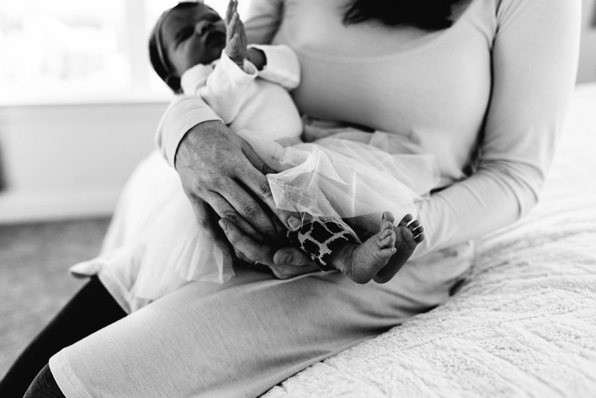 Mother-holding-newborn-daughter-Columbus-Ohio-Photographer-Erika-Venci-Photography