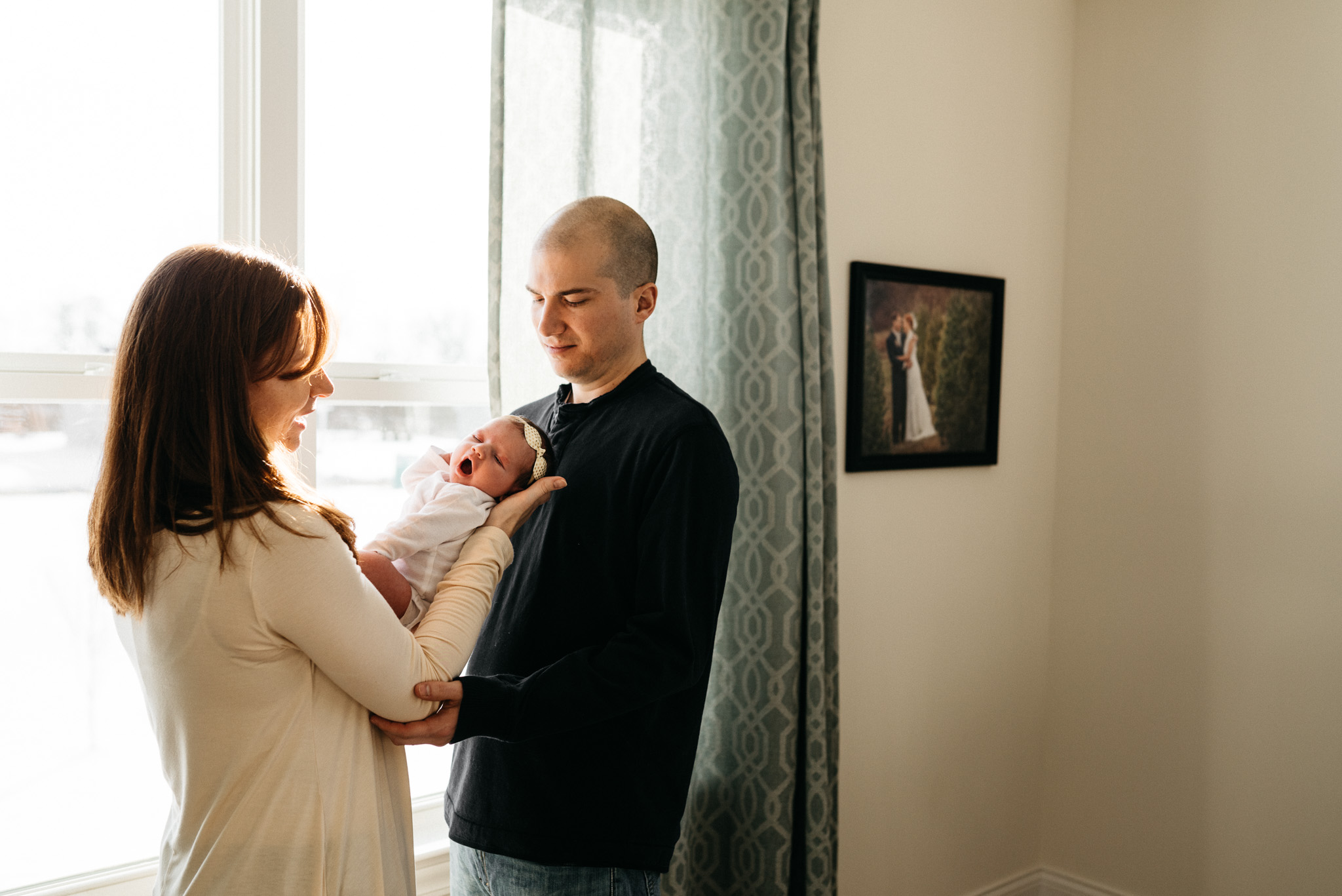 Parents-holding-newborn-baby-girl-Columbus-Ohio-Photographer-Erika-Venci-Photography