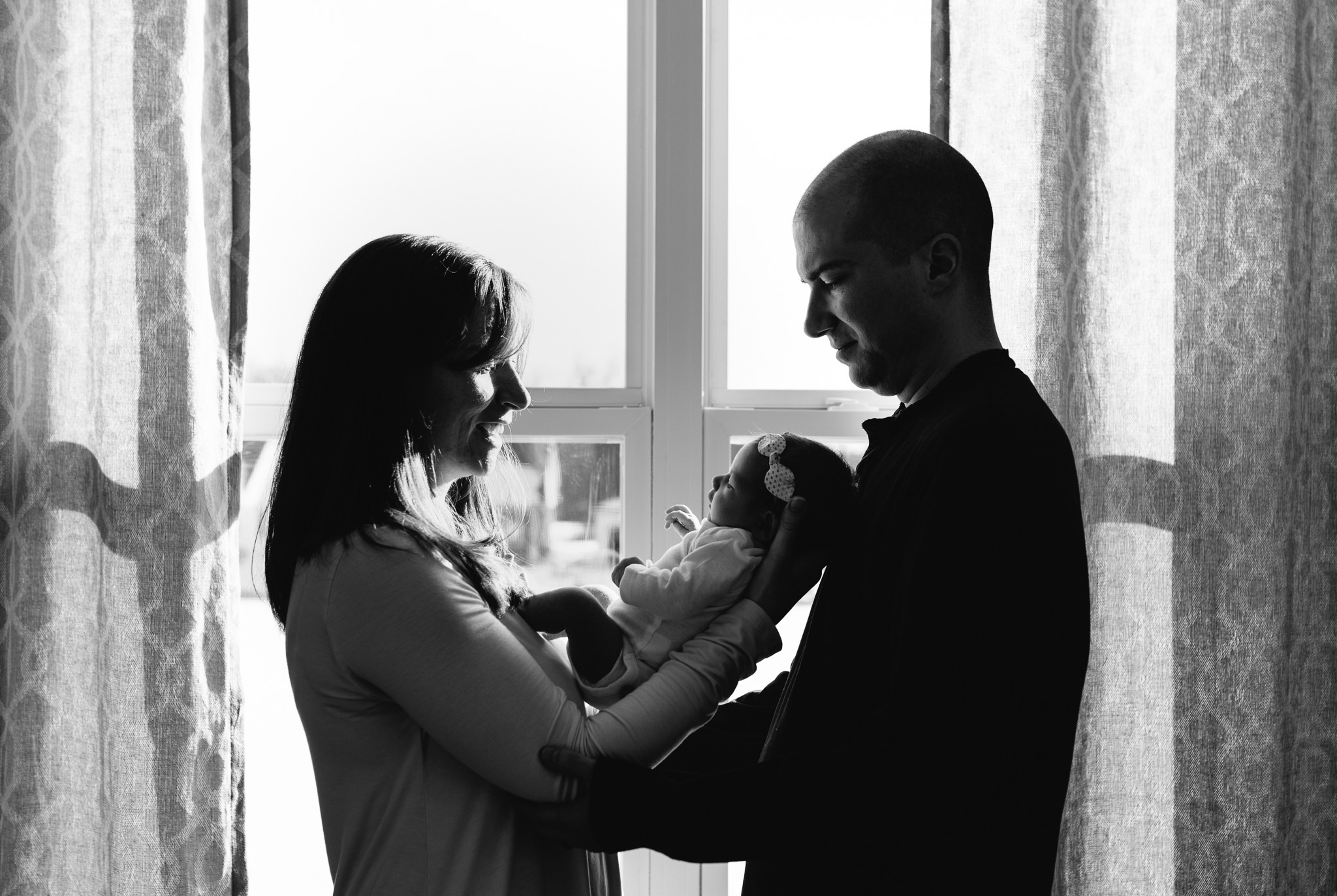 Parents-holding-newborn-baby-girl-Columbus-Ohio-Photographer-Erika-Venci-Photography