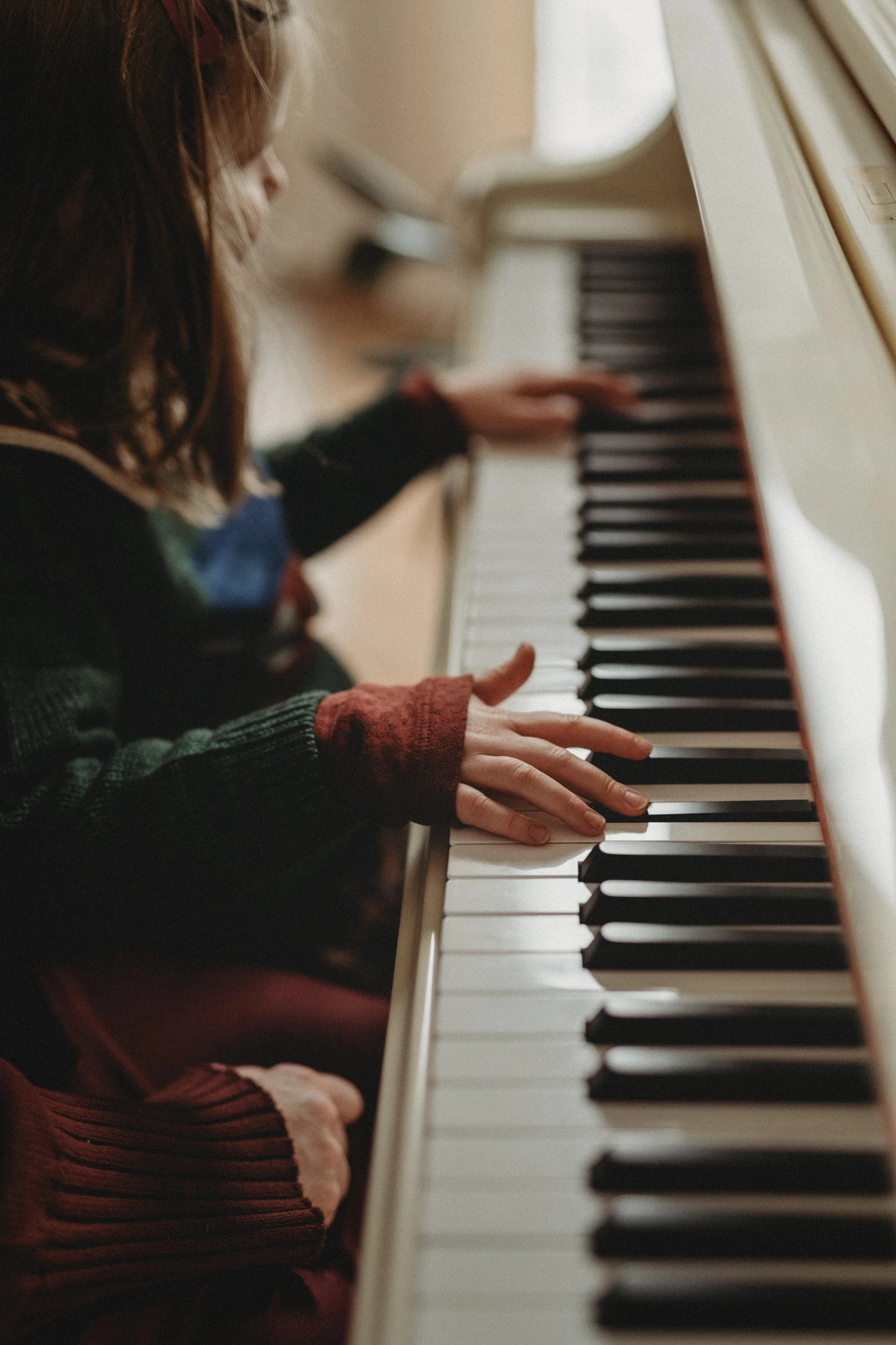 Children Playing Piano During In-Home Family Session