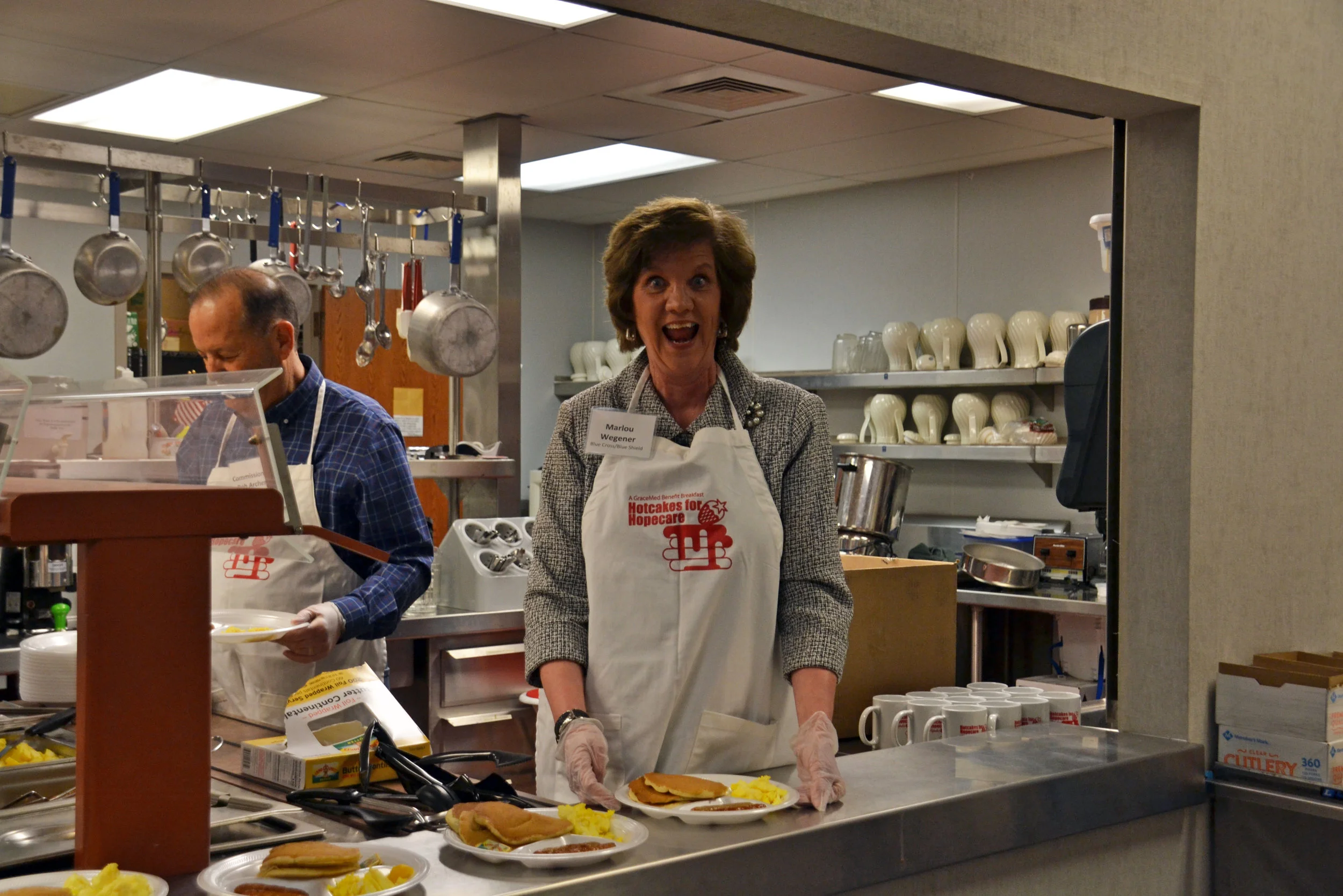 Marlou Wegener from Blue Cross Blue Shield serves with a smile