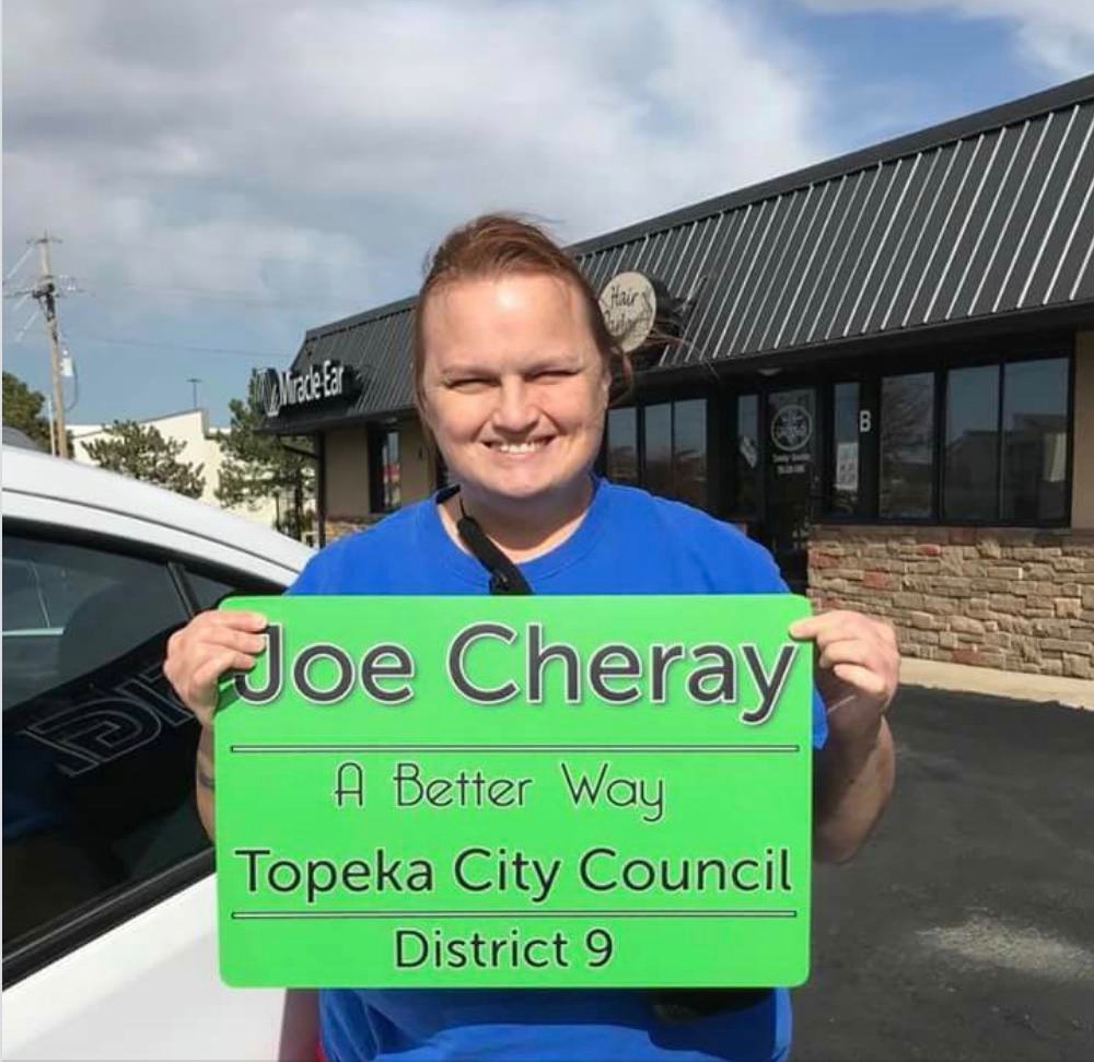 joe-cherary-with-council-sign.jpeg