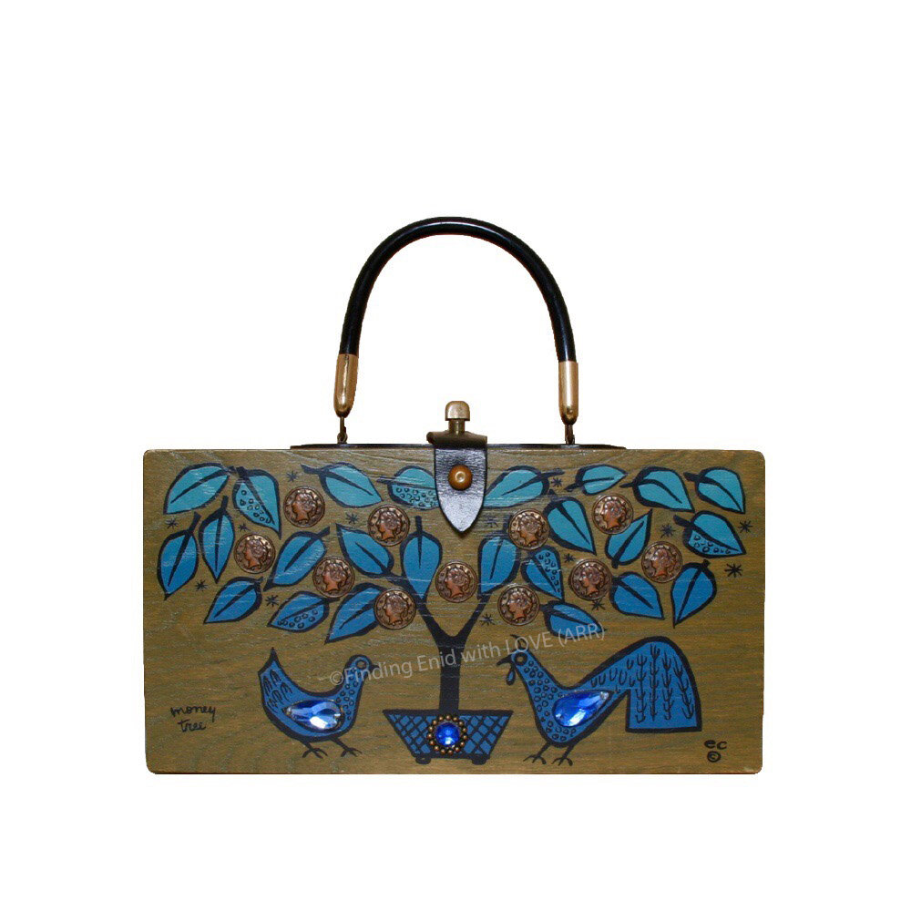 Where does an Arizona Tiki Oasis pirate stash their tiki-bar cash? Why, a bling-covered booty bag, of course! 

Here&rsquo;s a 1967 Enid Collins of Texas &ldquo;moneytree&rdquo;, one of the designs that launched Enid to fame. 

##arizonatikioasis #ti