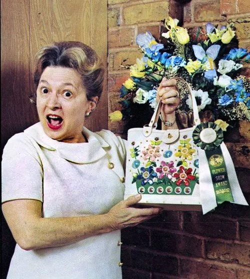 Wait. What?! A Texas A&amp;M floral show inspired by Enid Collins? 

Yep. Nearly 100 vintage original Collins of Texas bags and other objects from the Finding Enid with LOVE, L3C Collection are traipsing to Texas to be part of "Elements with Eni