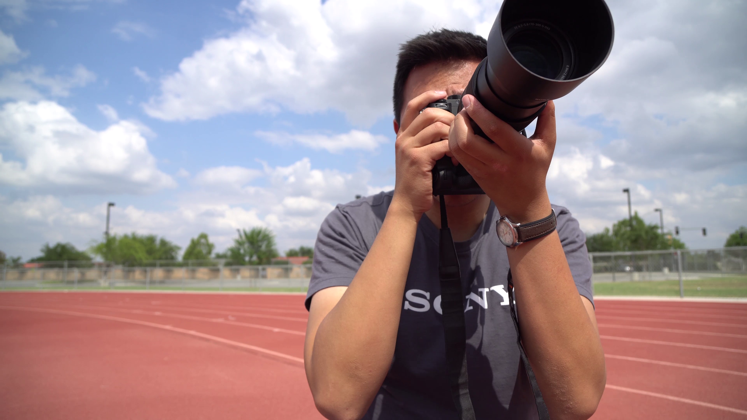 Shooting with the Sony 70-300 on the a7Rii. Waiting on track runners to start their race.