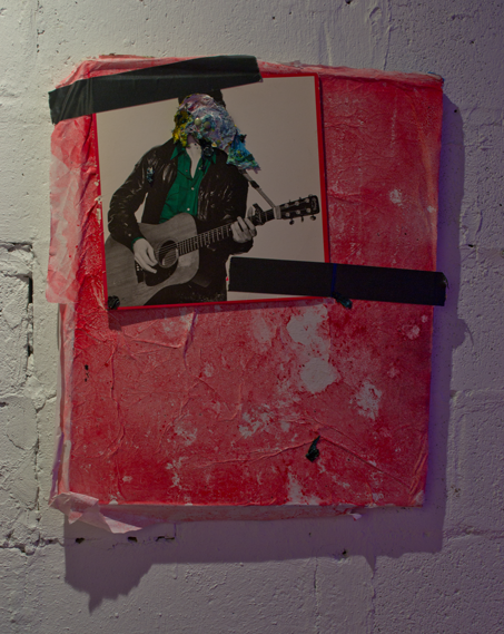 Untitled oil, spray paint, and collaged paper on canvas 2015