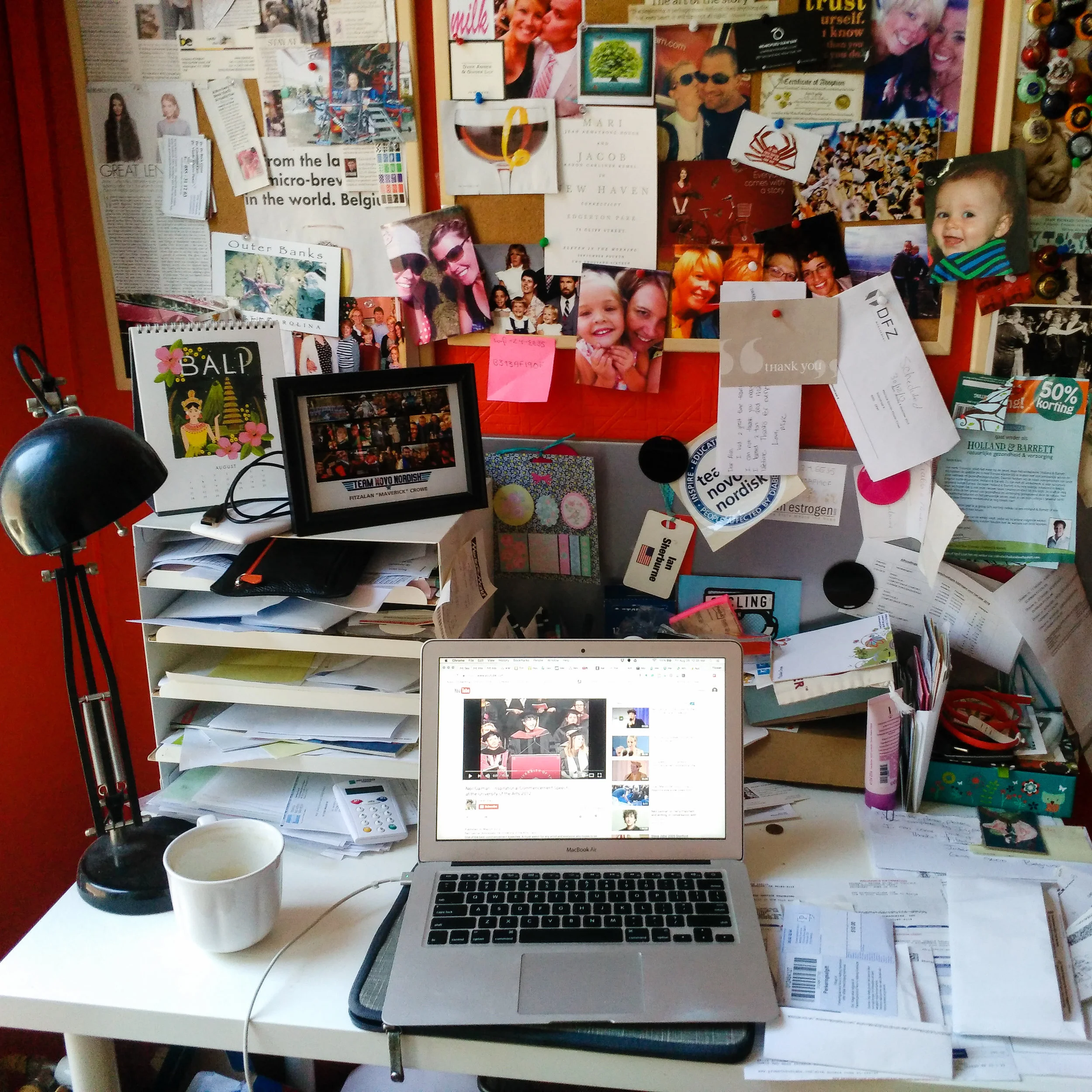 And finally home. I know it looks super cluttered and crazy, but I'm rarely here. I love looking at all the photos on the corkboard above and all the paper on the right are the bills and paperwork that I MUST deal with before leaving on the road again.
