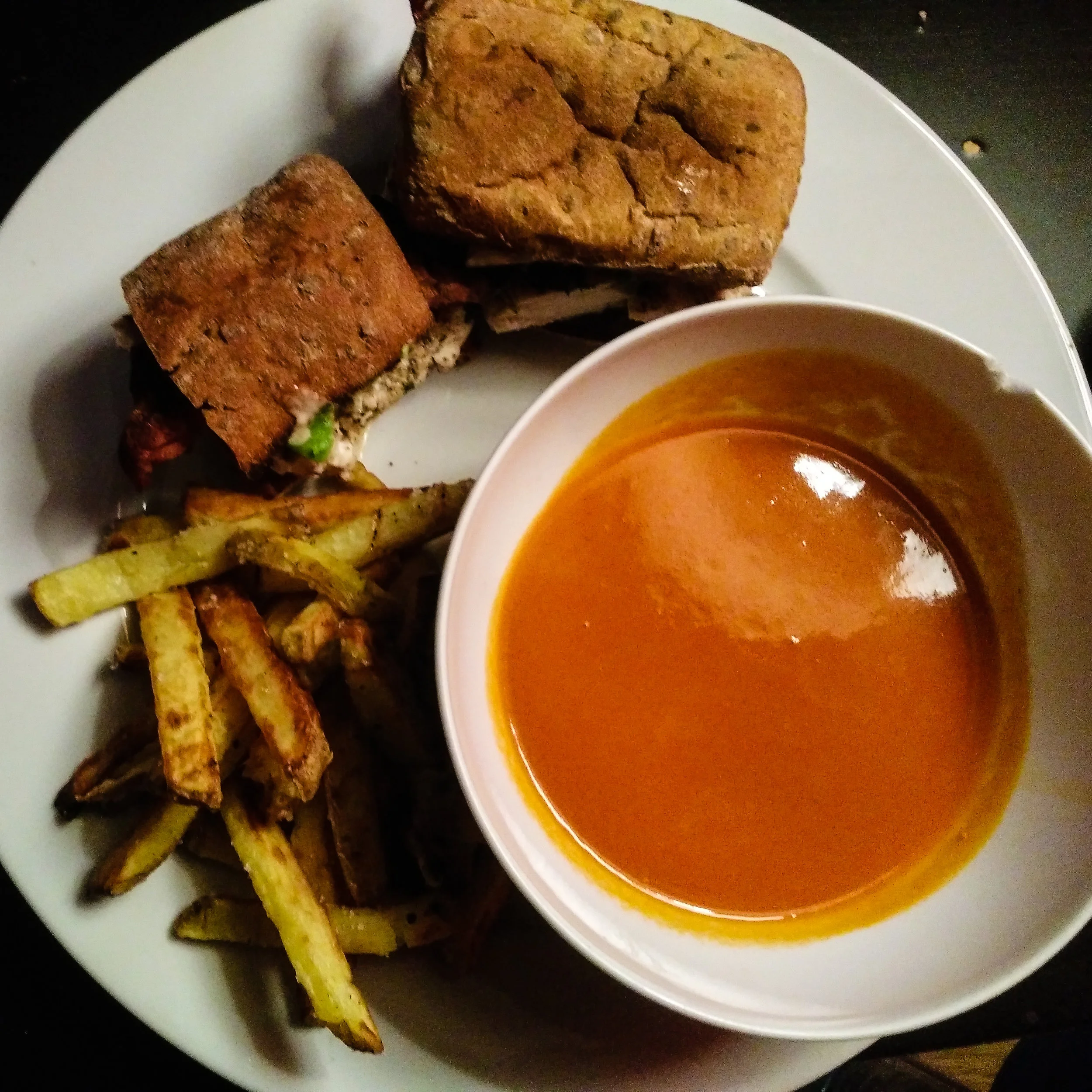Fantastic dinner of chicken, avocado, bacon sandwich on gluten-free bread with a chipotle mayo. Side of homemade oven cooked fries and a organic tomato soup (which I was too full to eat).