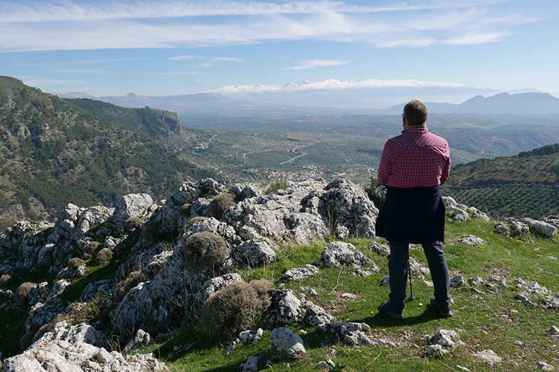 Taking in the view over Los Olivares, Vega de Granada and the snow capped Sierra Nevada