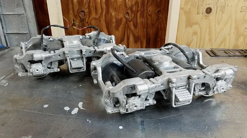 Our 1" scale Bloomberg trucks are the standard for many railroads. With four 24v 150 watt traction motors and 40" scale wheels these units pack a big punch. Fully sprung with scale Hyatt journal boxes they are ready for service at the club or in the…