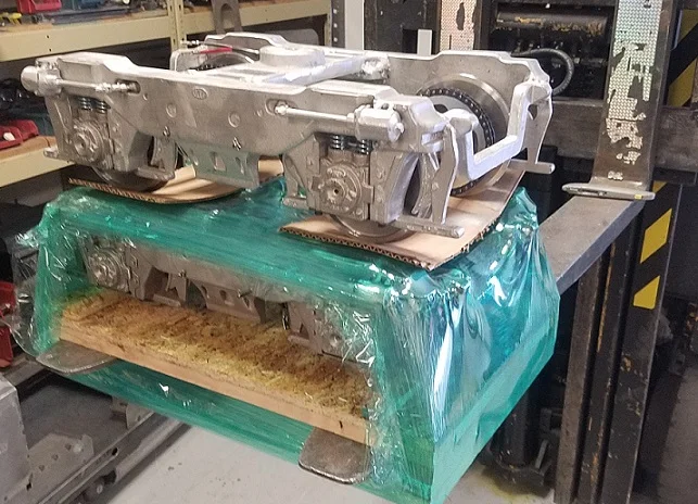 A set of 1.5” scale Flexicoil trucks getting crated up for shipping…