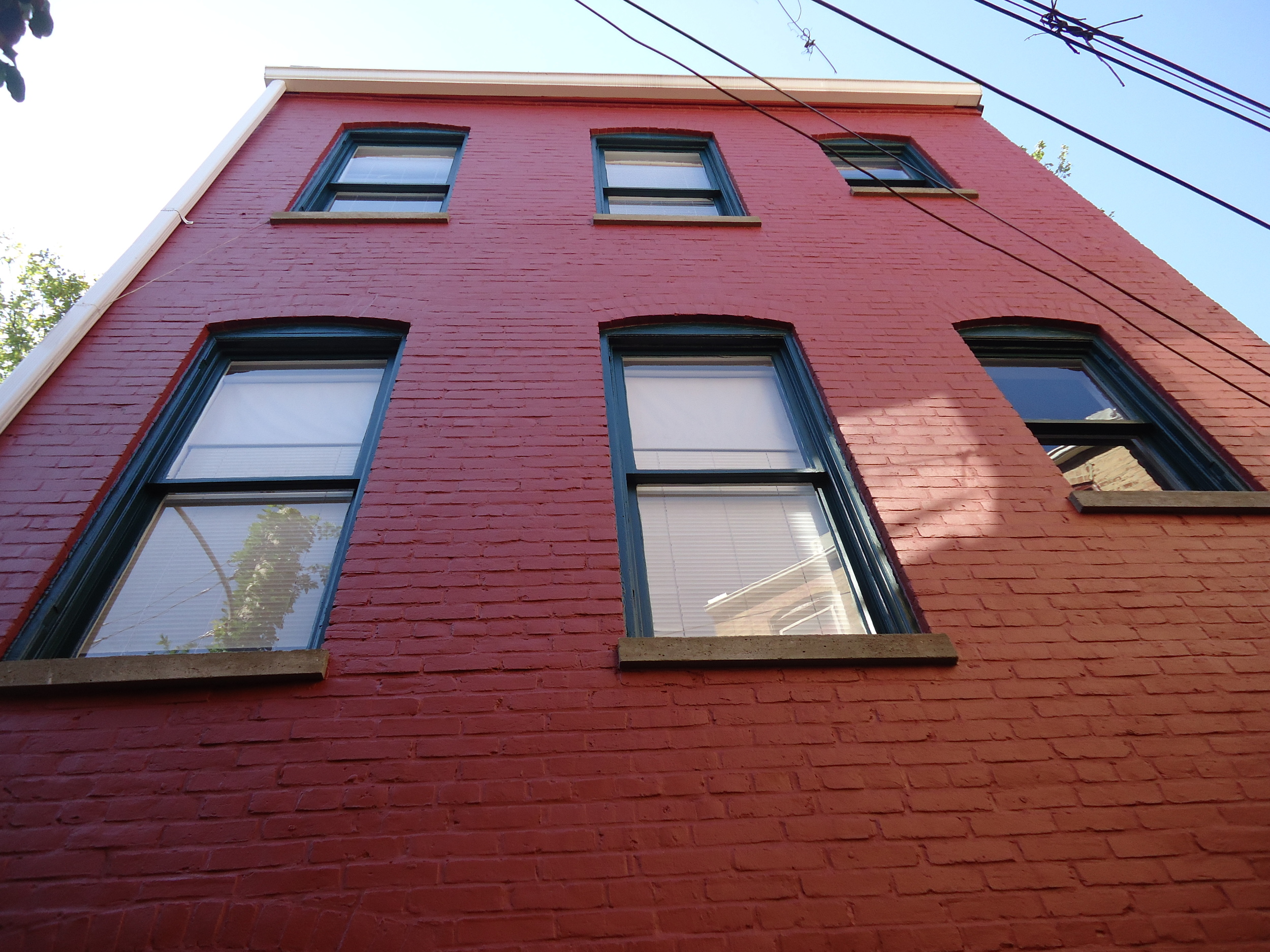  Painted Exterior Brick Walls and Refinished Windows 