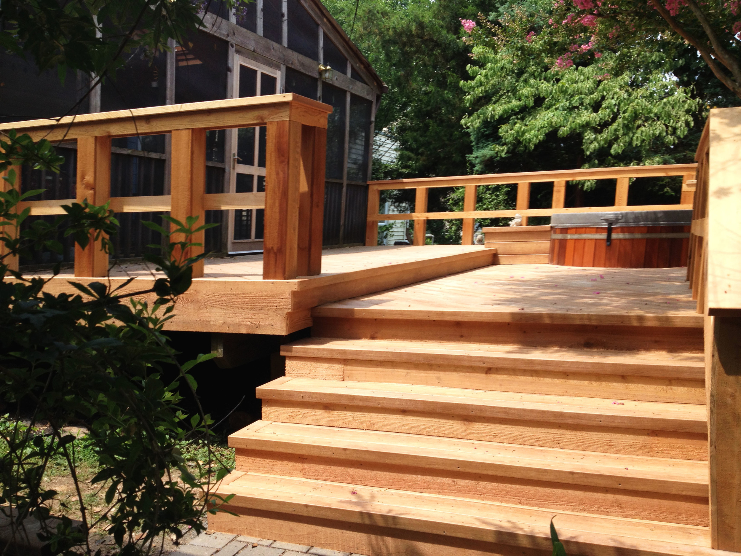  Wooden Deck with Rails, Stairs, and Hot Tub. 