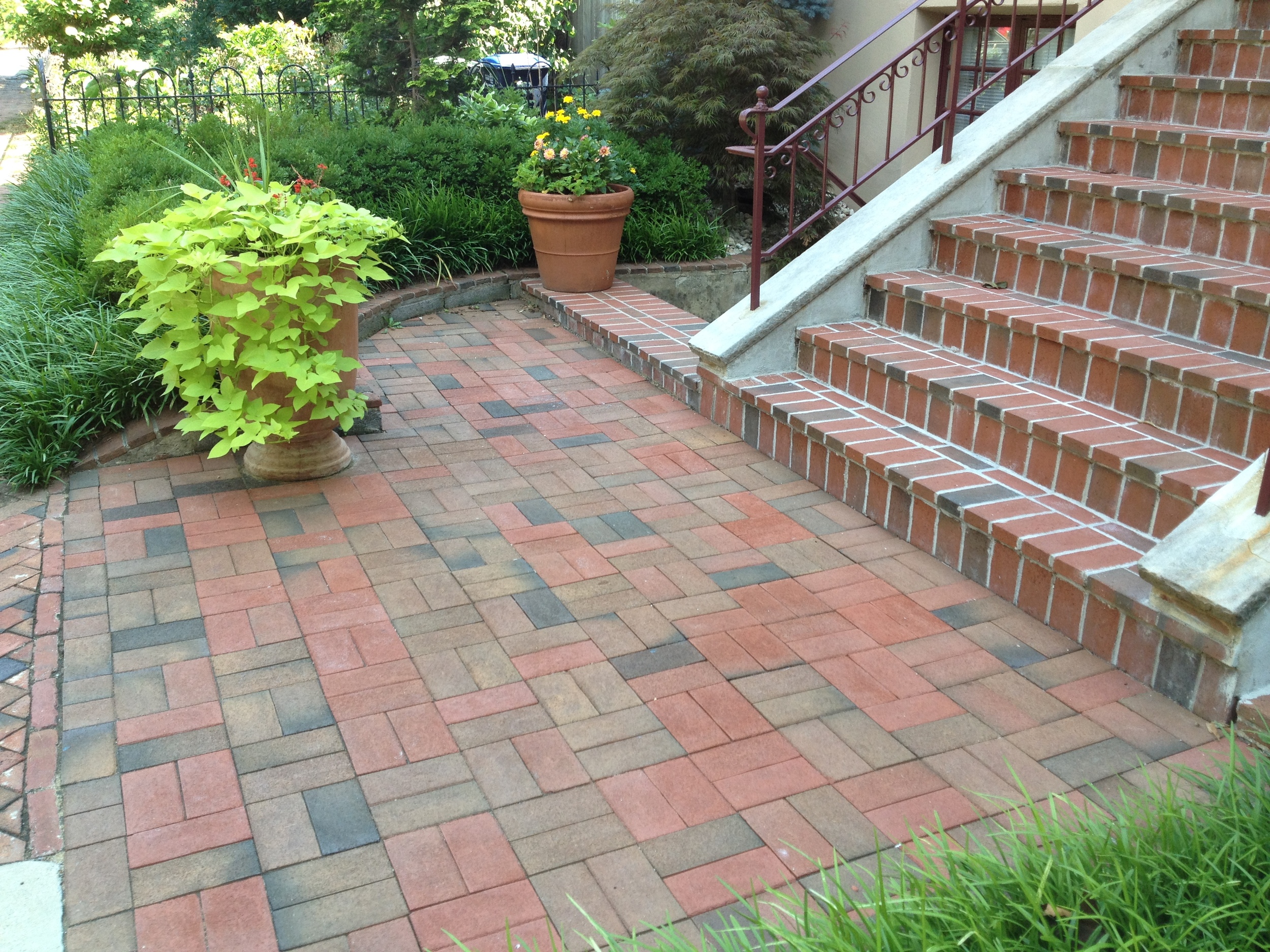  Patio with Pavers and Complementary Brick Stairs. 