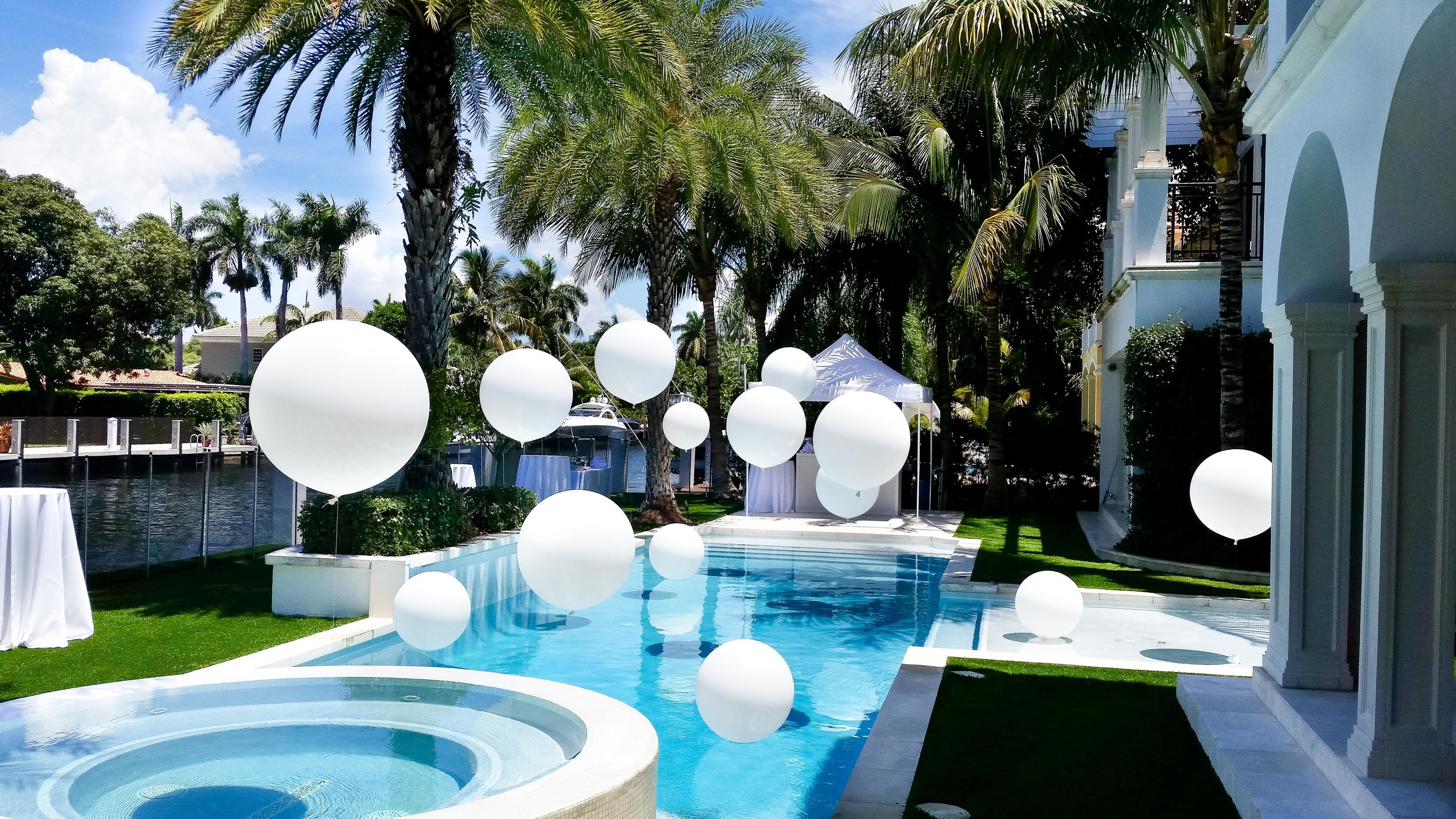 pICTURED: WHITE OVERSIZED LATEX BALLOONS