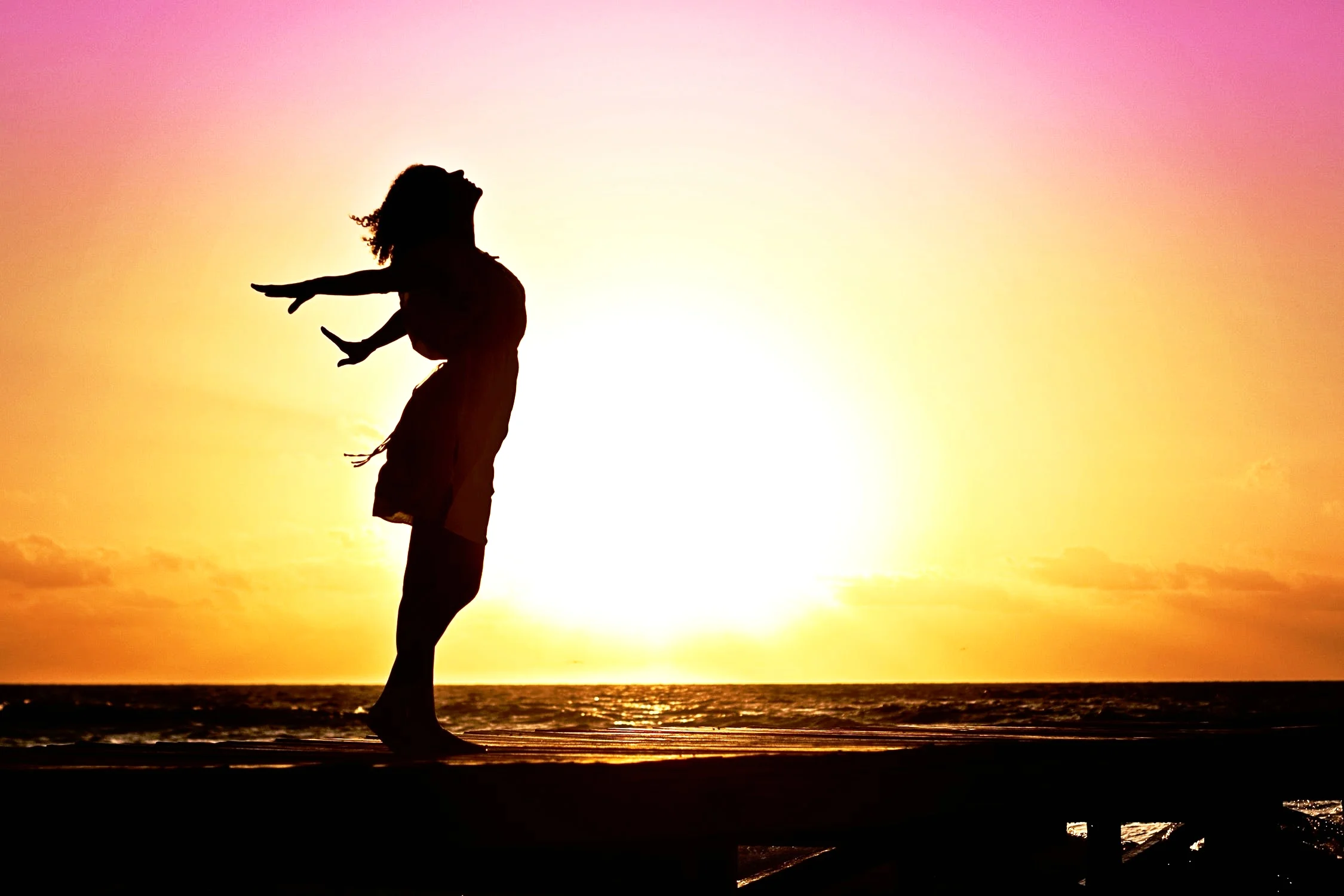 woman-happiness-sunrise-silhouette-40192.jpeg