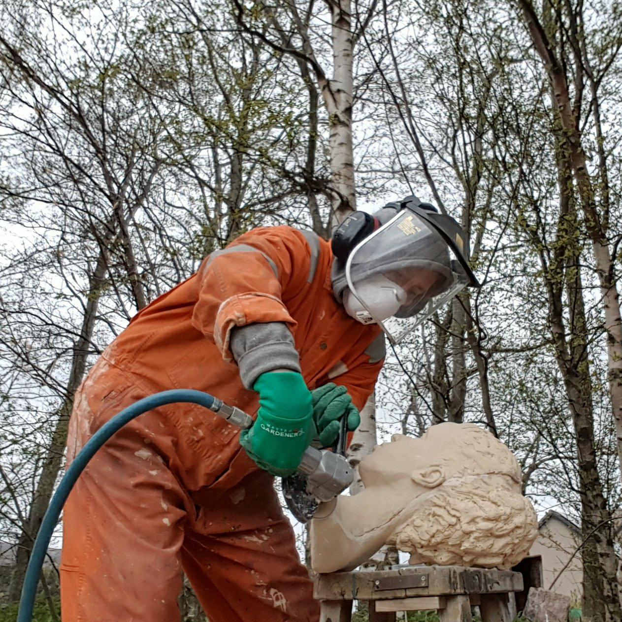 Grinding with an air powered grinder. 