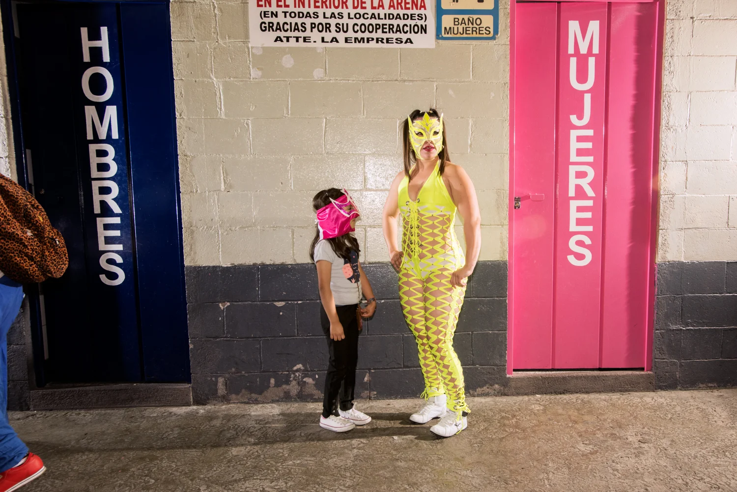 Luchadoras Luchadoras: Lucha libre is a popular form of professional wrestling developed in Mexico characterized by colorful masks, rapid sequences of holds and maneuvers, andhigh-flying maneuvers. So embedded is lucha libre into daily life, Arena México in Mexico City has matches every night of the week. Female wrestlers are luchadoras . Many of the women come from extended wrestling families that form their own stables, and follow in the footsteps of their fathers, husbands or brothers. Never headliners, the luchadoras serve as opening acts for the most popular male wrestlers, earning less than their male counterparts. It takes years to become a female wrestler for the Arena México. All of the women have full-time jobs—EMT, personal trainer, coffee/smoothie shop owner—and yet train 3-4 days a week with mandatory training days at Arena México gyms. Some of the luchadoras travel to the United States to compete and to coach, but more often to Japan where lucha libre is more popular.