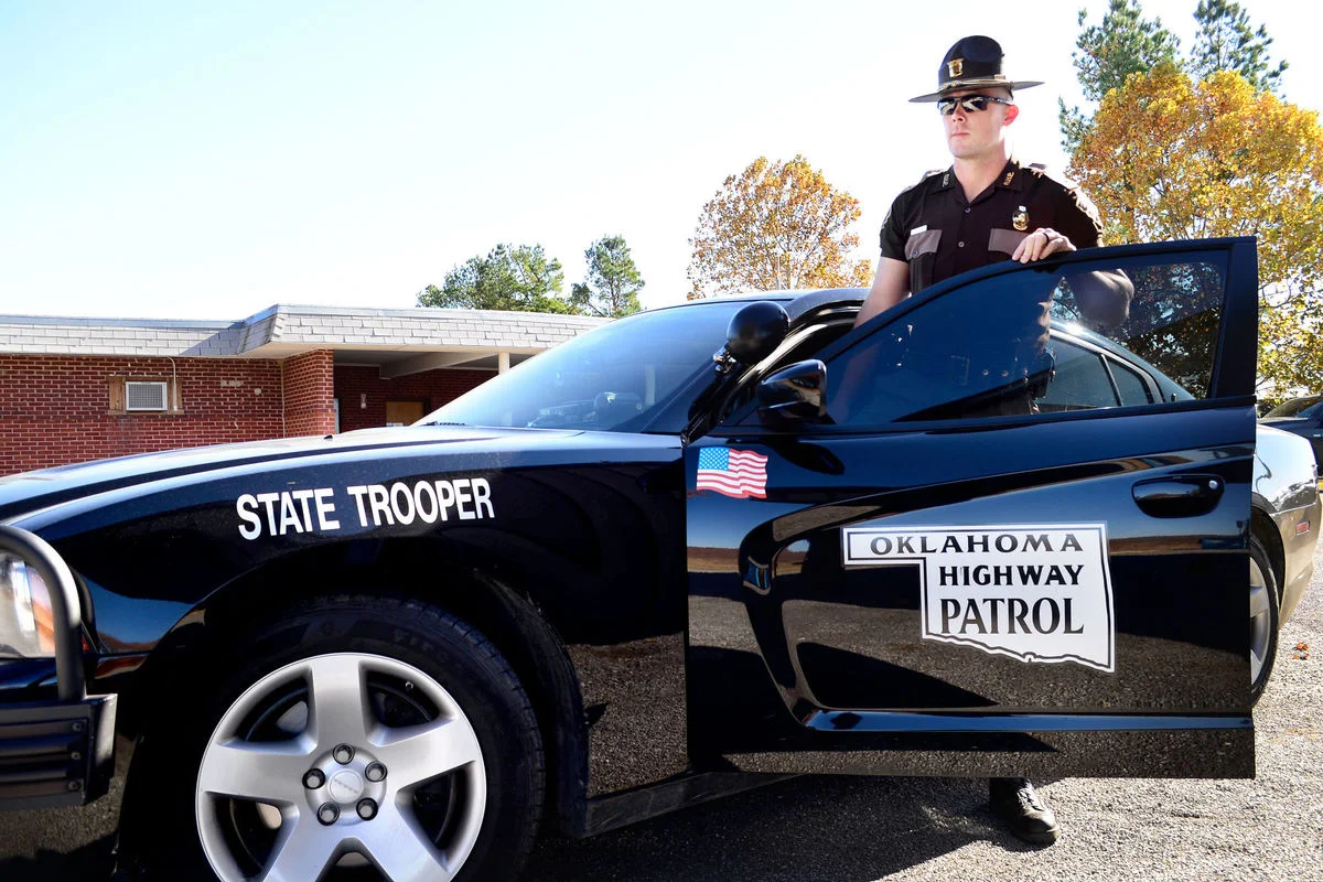 The Oklahoma Highway Patrol requires that applicants have completed a certain number of credits from an accredited college or university, so no written exam is required.