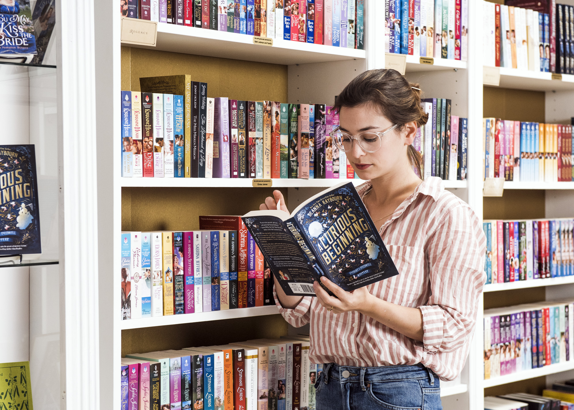 Bea reading A Curious Beginning