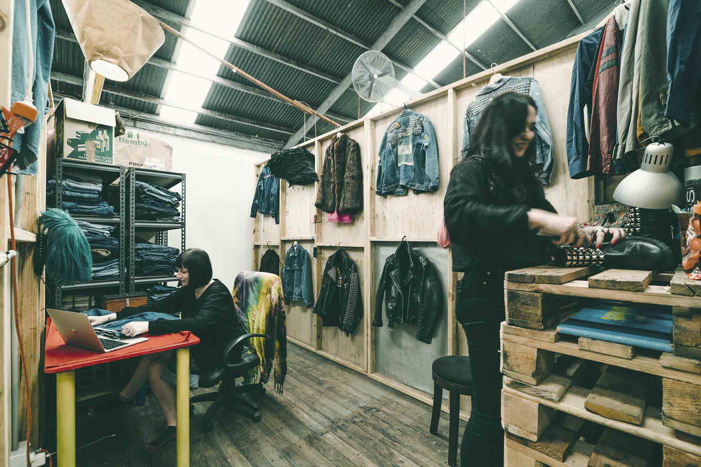 The infamous denim queens of One Thirty repurposing vintage demin in their space at Nauti.jpg