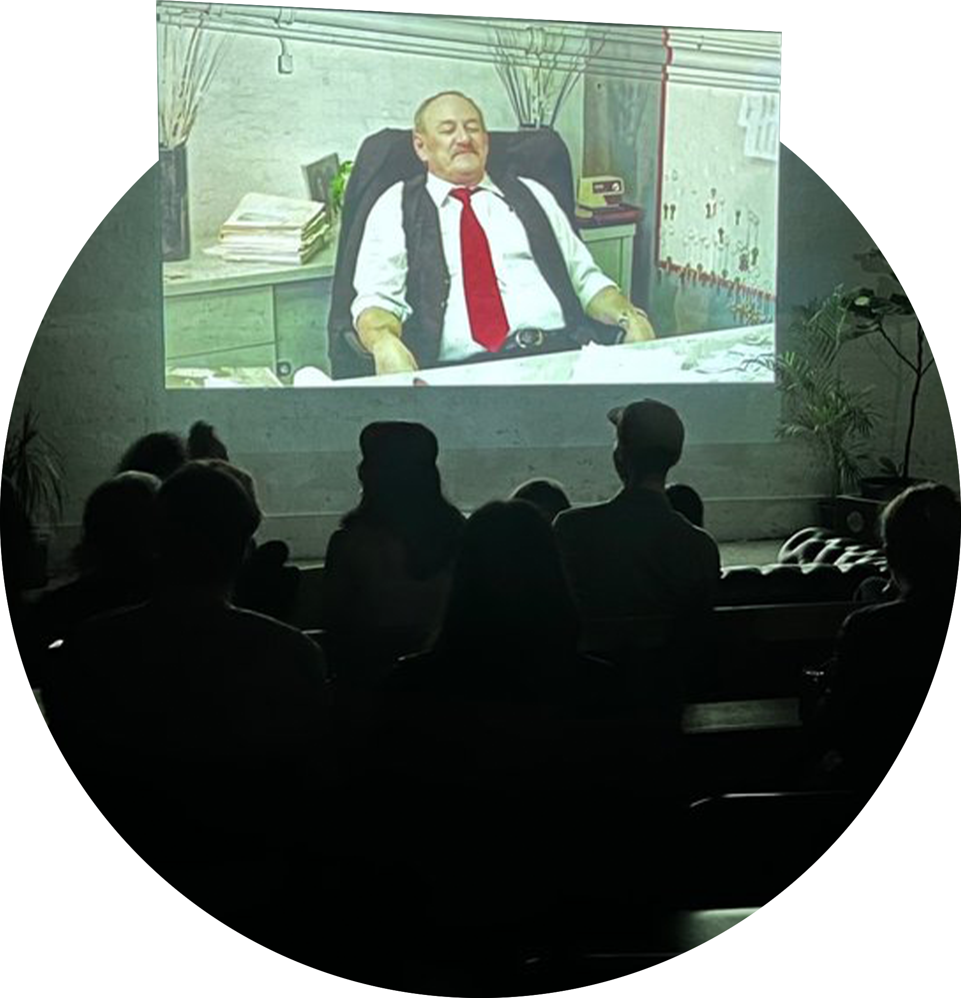 People watching a B-grade movie at Best Worst Movie Club at Nauti Studios Sydney.