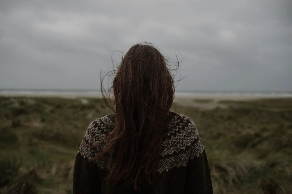 Astrid models her latest design, the Afterparty jumper. It appears in Laine 6.