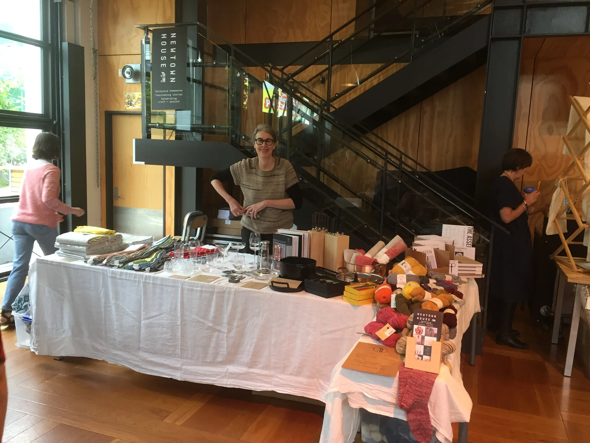 Setting up…tubs of yarny goodness in hiding.