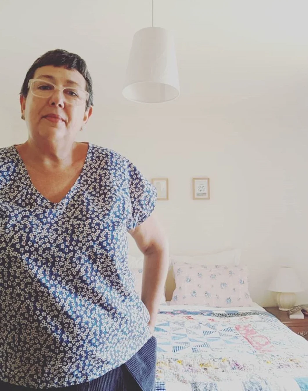 Jo Dunsmuir and one of her many beautiful quilts.
