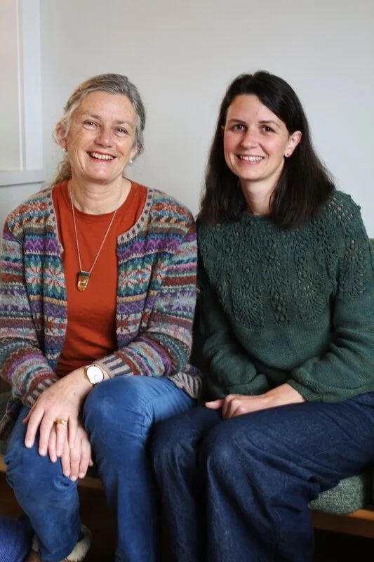 Sally Graham and her daughter, Frances Paki, live close enough for regular quality time together - including knitting, of course! Sally wears her Orkney Cardigan by Marie Wallin, while Frances is sporting the Whitehorse jumper by Caitlin Hunter and a pair of self-drafted trousers.