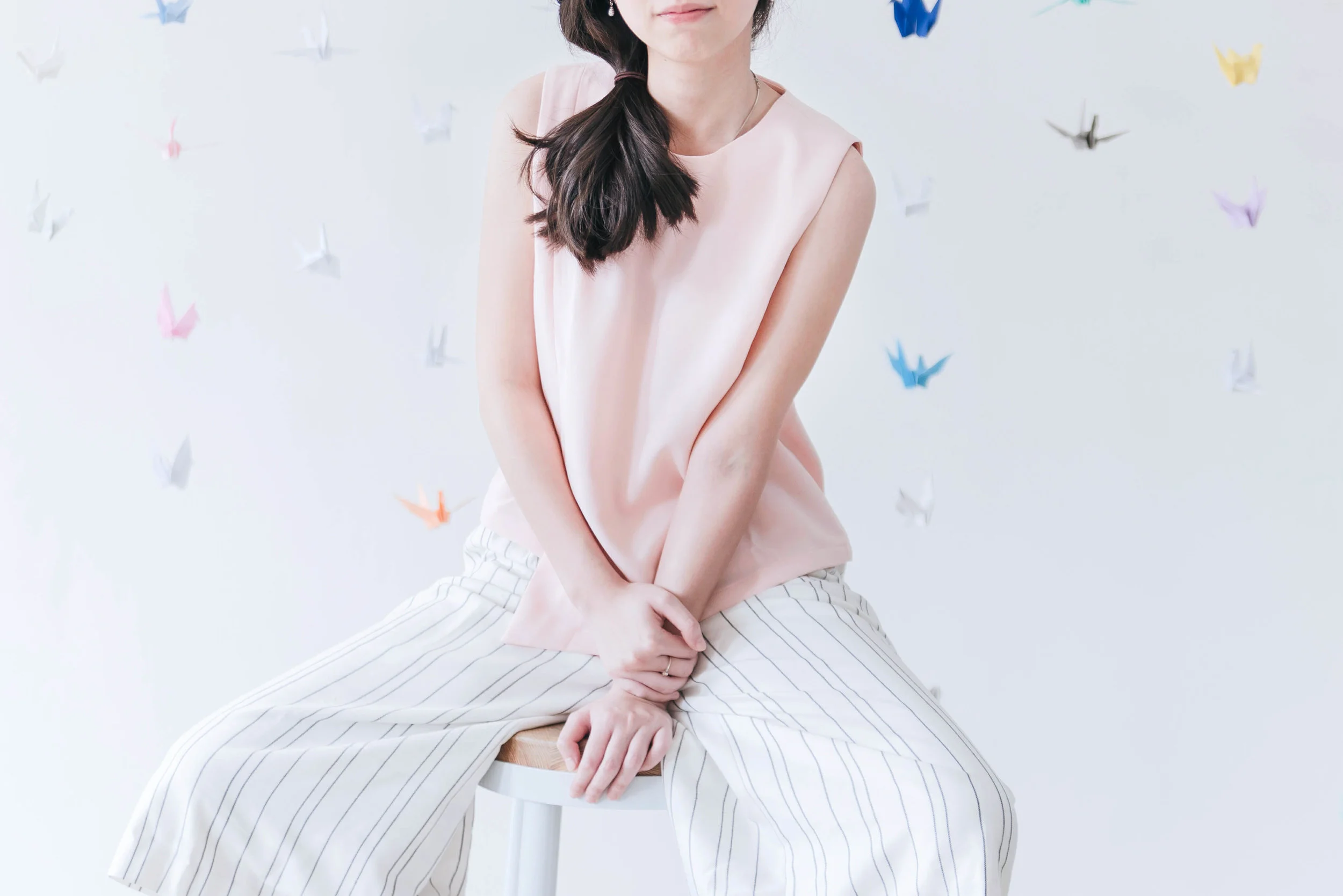 Sleeveless Top with Triangular Hem